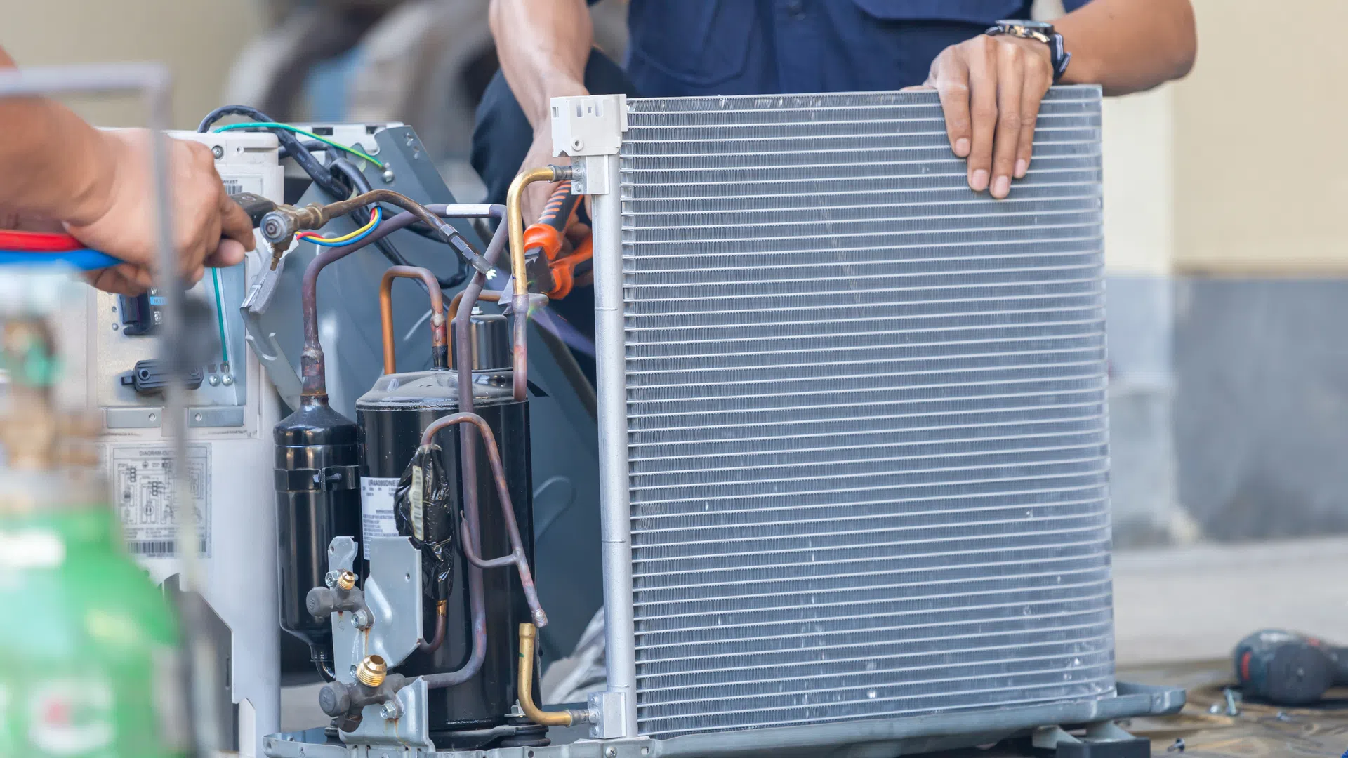 Technicians working on unit
