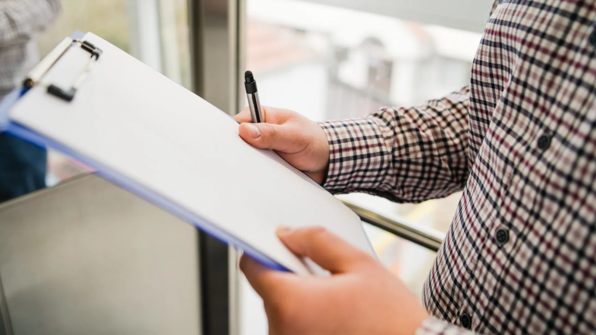 man holding a clipboard