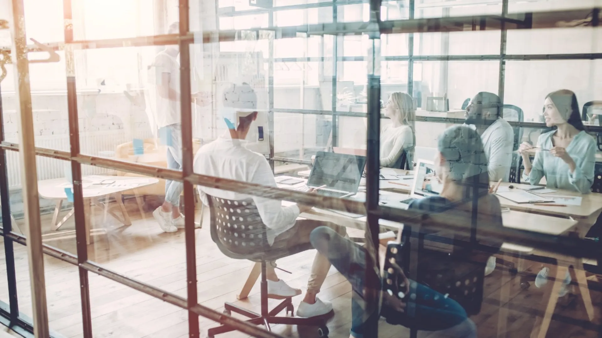 people sitting in a meeting