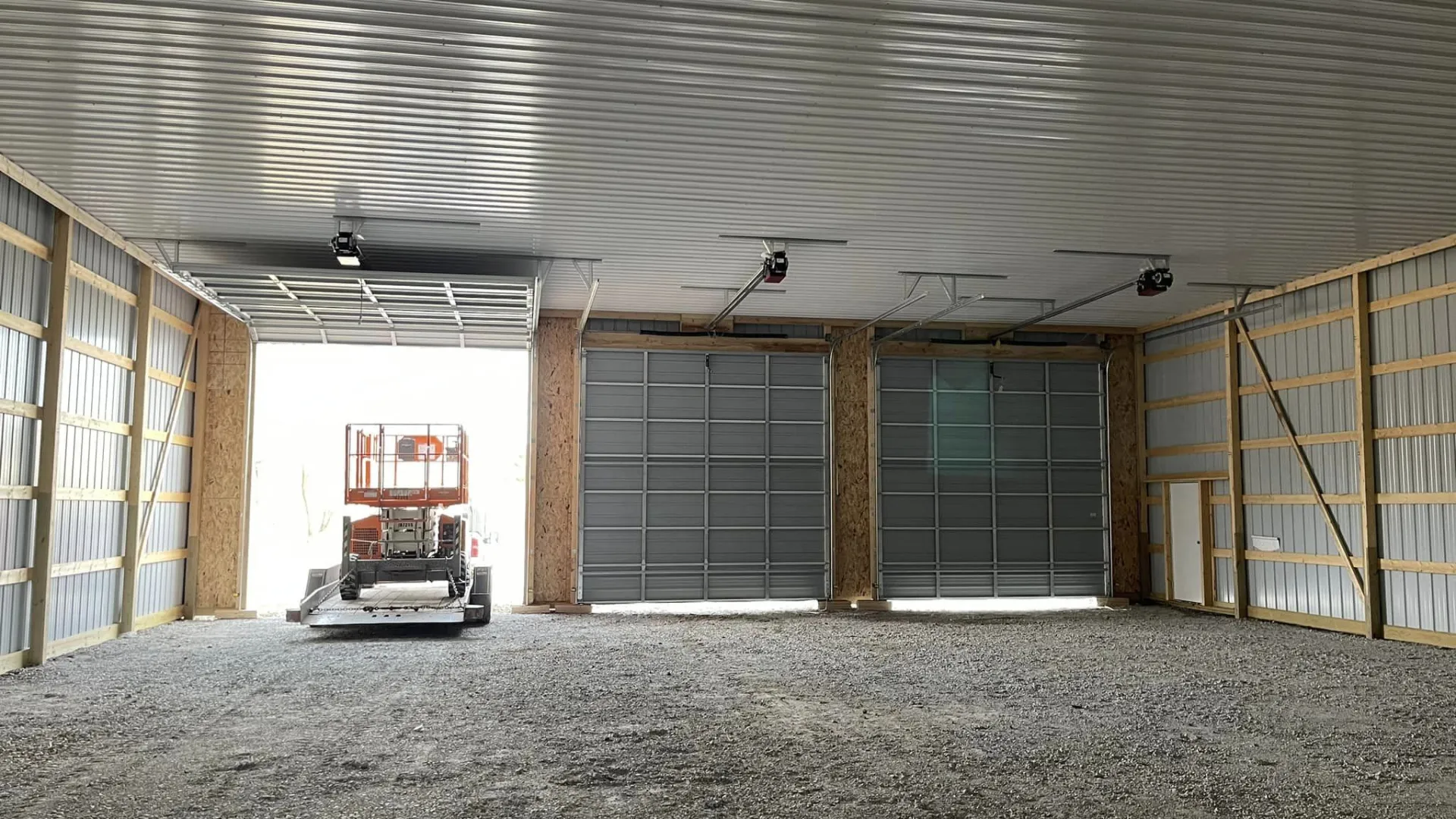 a garage with a tractor in it