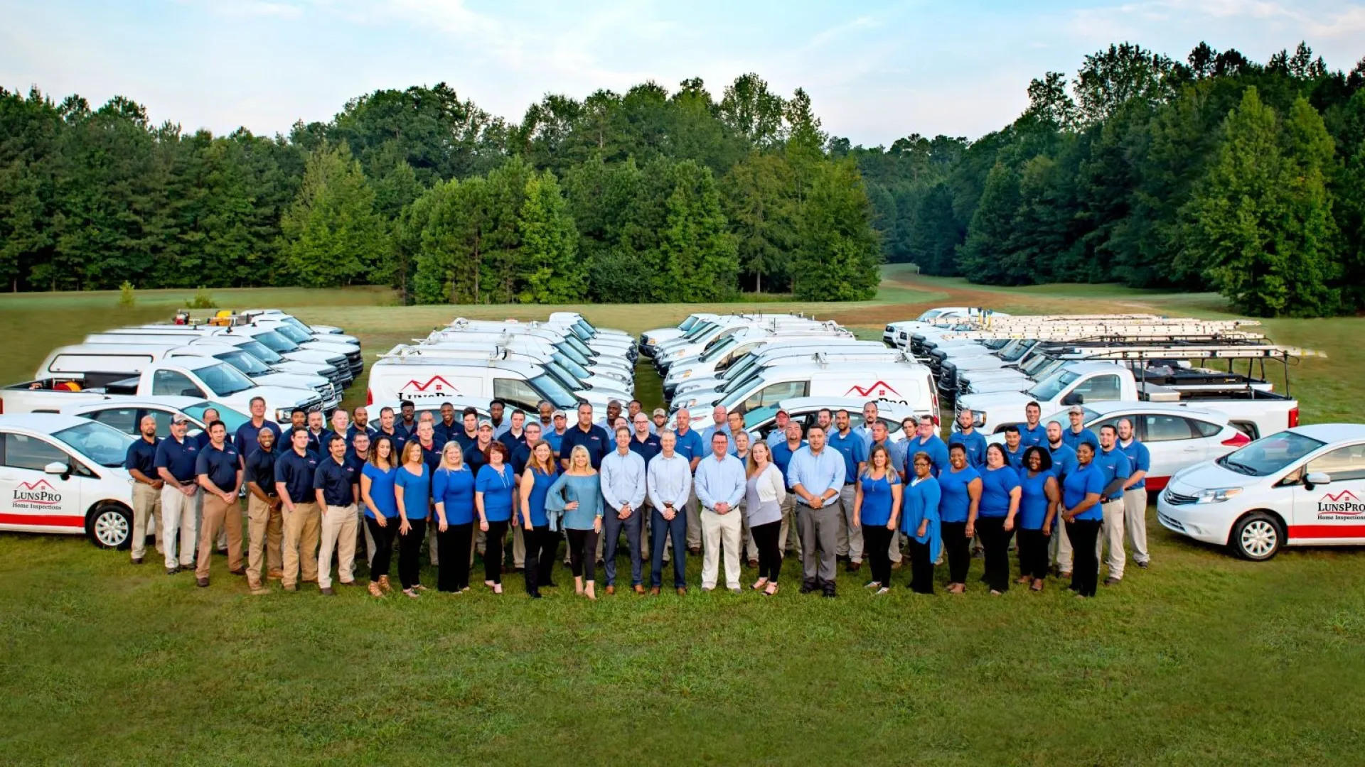 a group of people posing for a photo