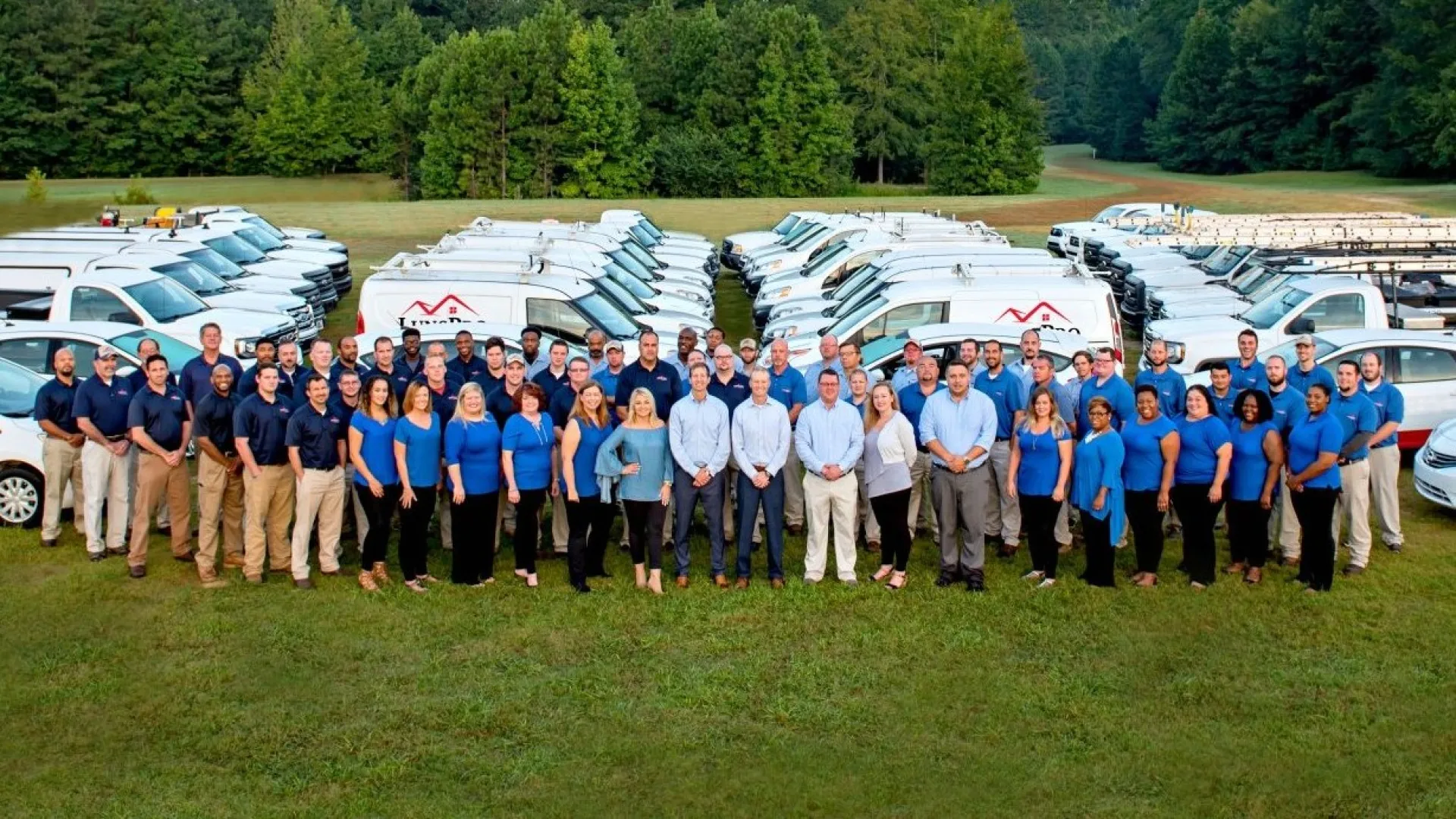 a group of people posing for a photo