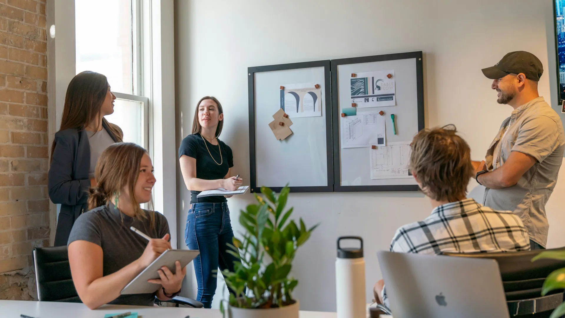 a group of people in a meeting