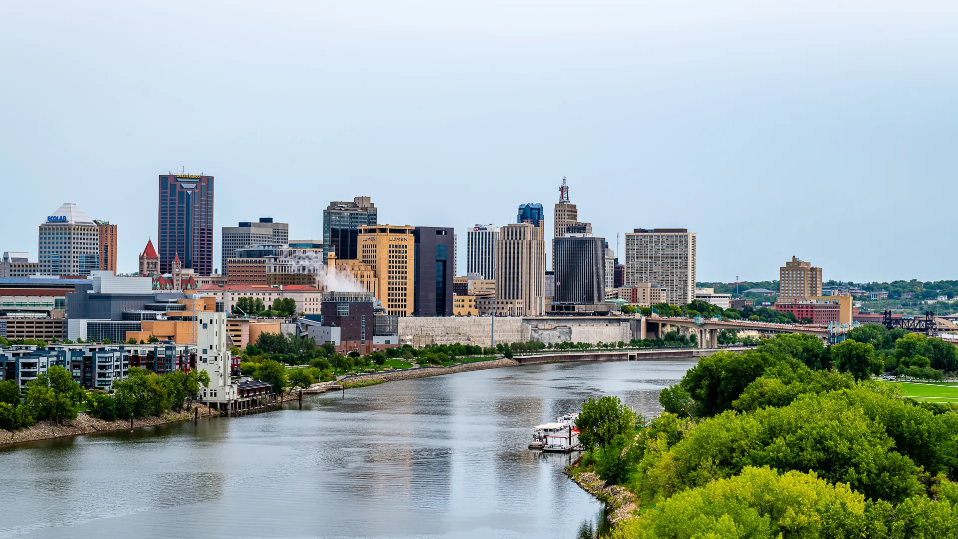 a river with a city in the background