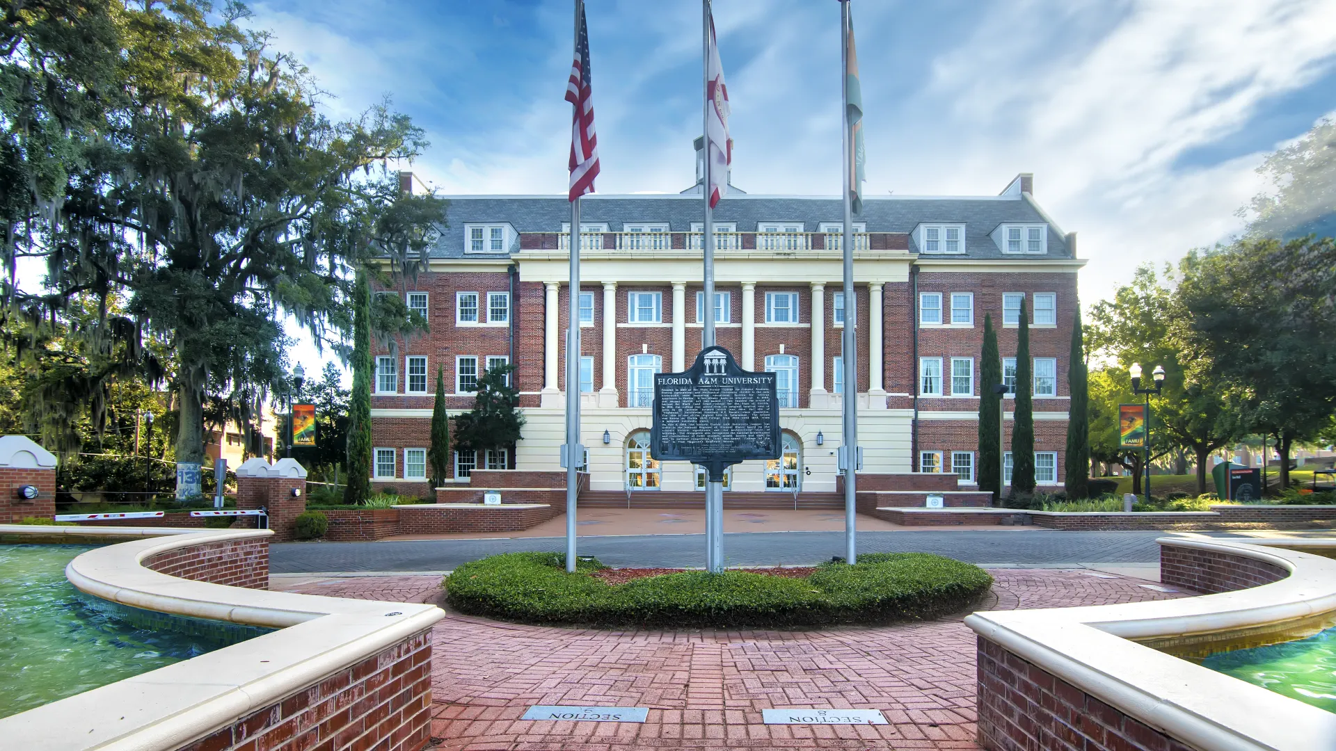 a brick walkway leading to a building