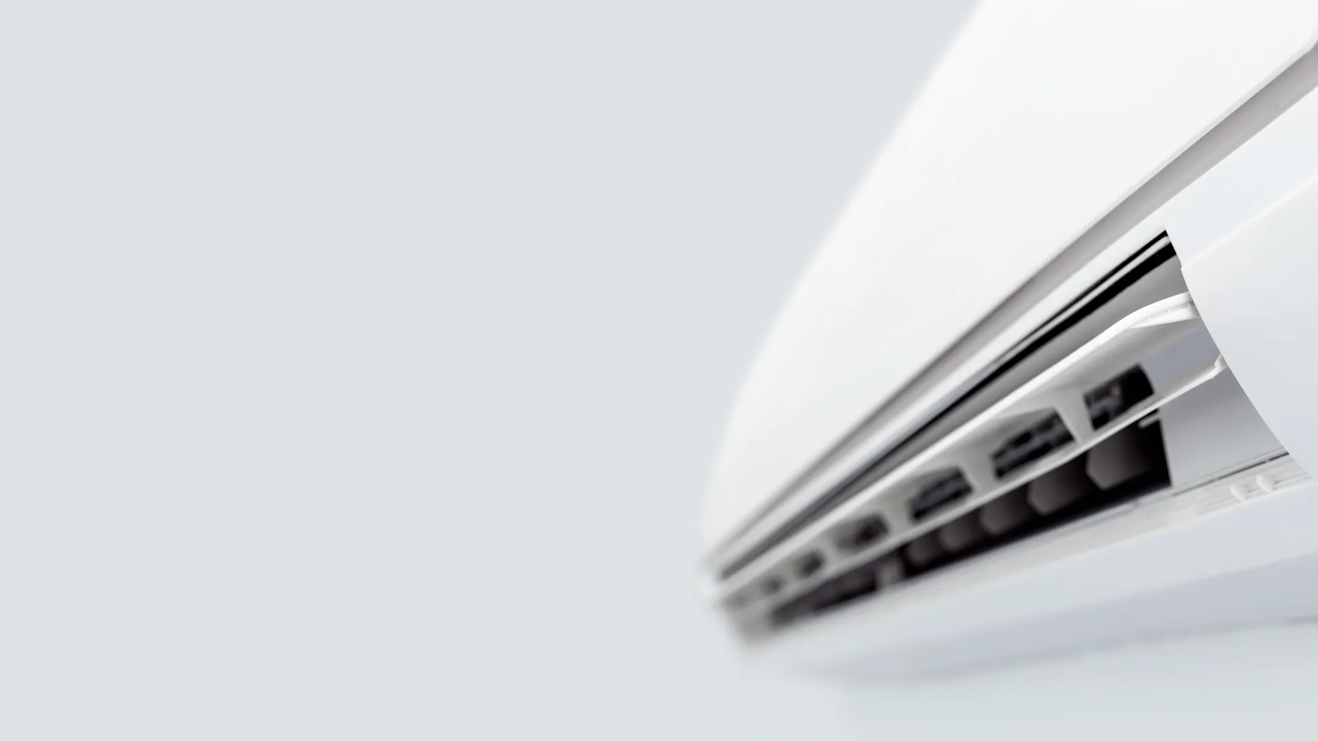 a white laptop with a black keyboard