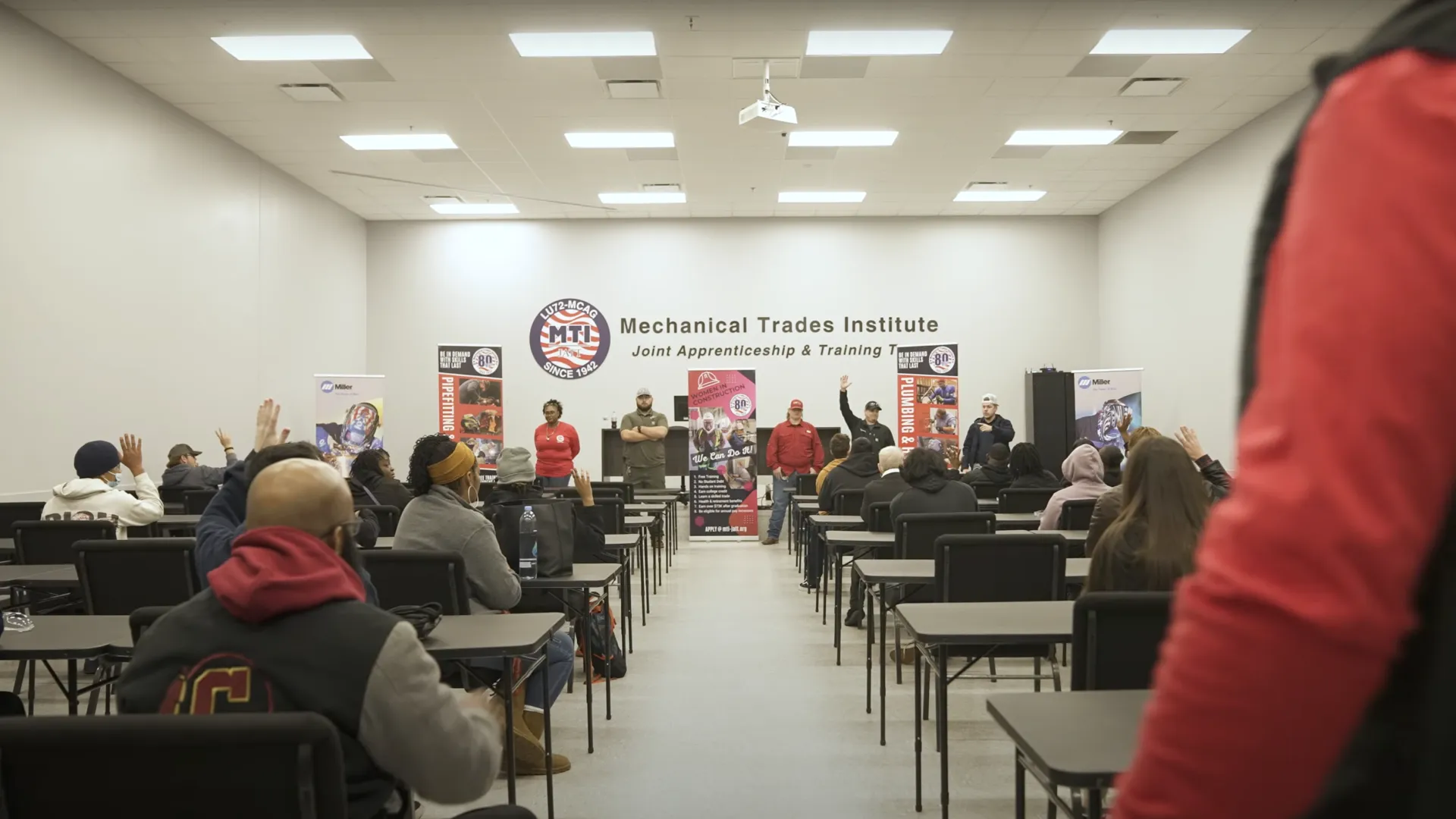 a group of people in a classroom