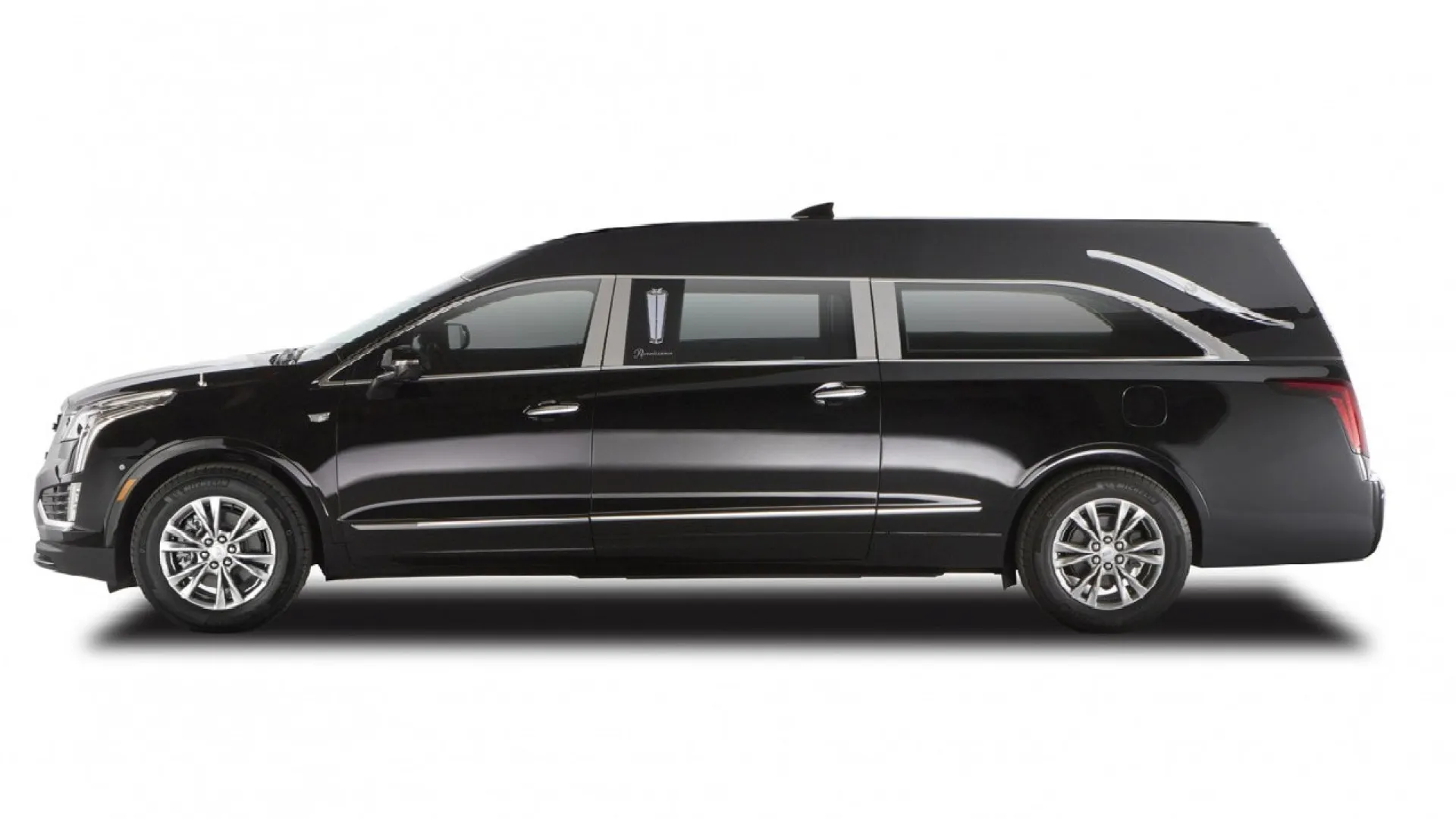 Side view of a sleek black luxury limousine showcasing elegant design and spaciousness.