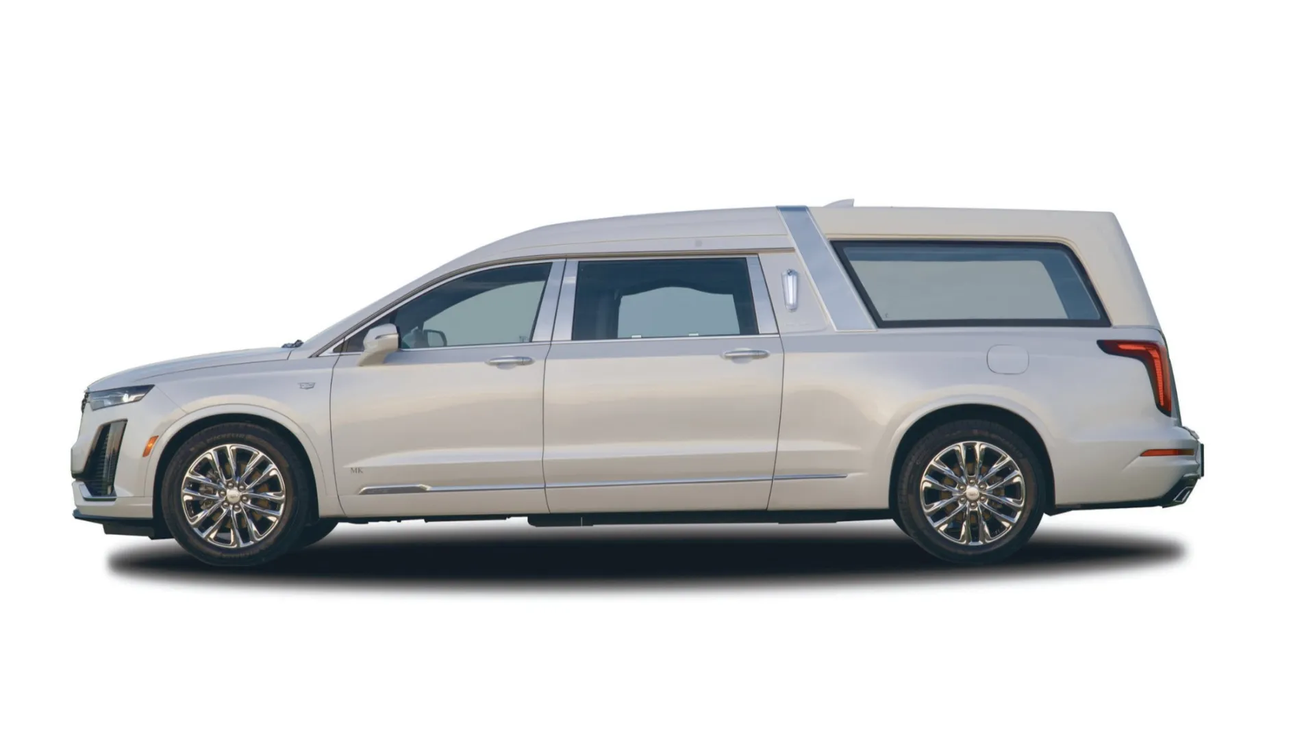 Black Chrysler minivan parked in a studio with a clean background showcasing its sleek design.