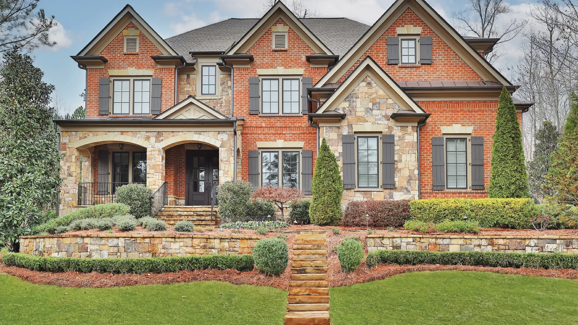 Brick Home with Bronze Casement Fiberglass Replacement Windows by North Georgia Replacement Windows