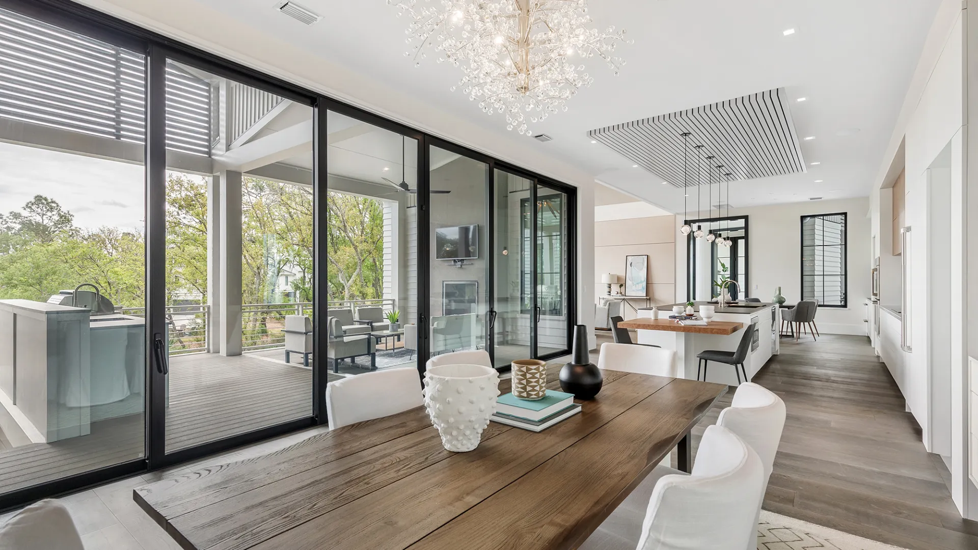 a large dining room with a large glass door
