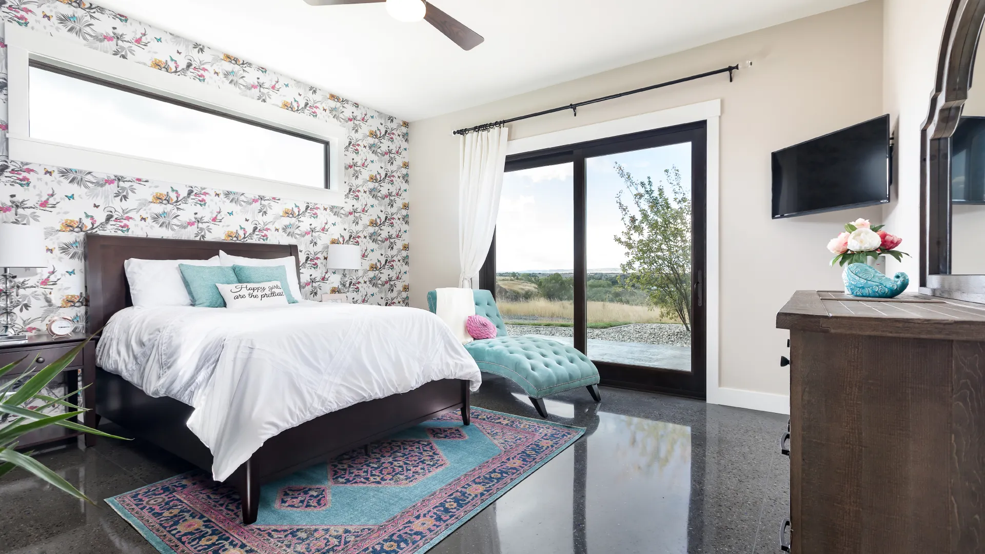 a bedroom with a large window