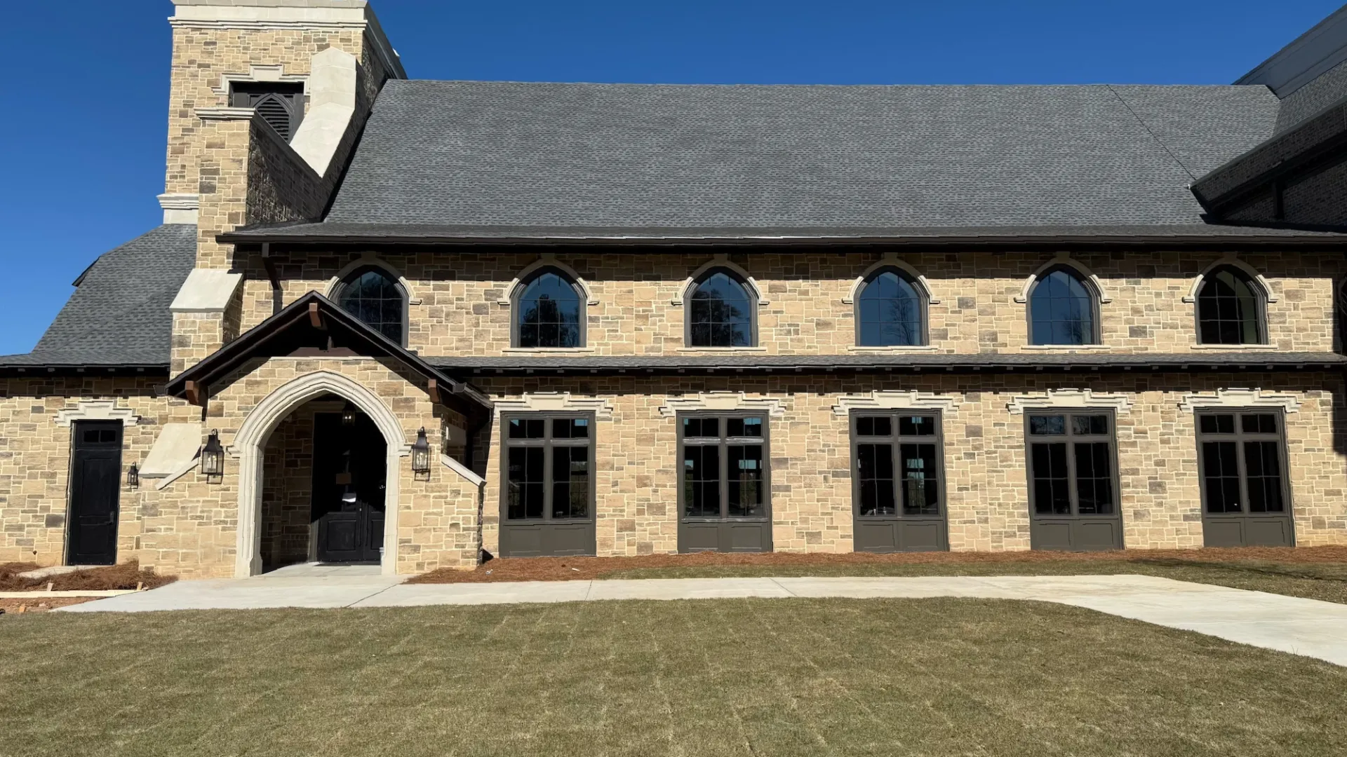 Exterior view of Faith Community Church in Woodstock, GA featuring new windows and doors by North Georgia Replacement Windows
