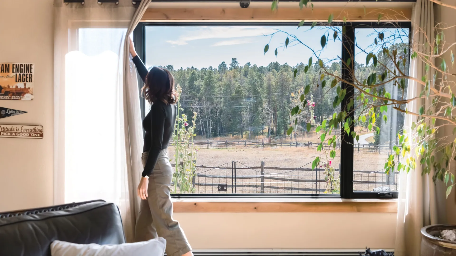 a person standing on a window ledge