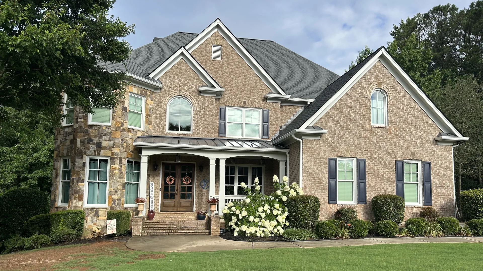 The owner of this large brick home chose North Georgia Replacement Windows as their Infinity windows installer