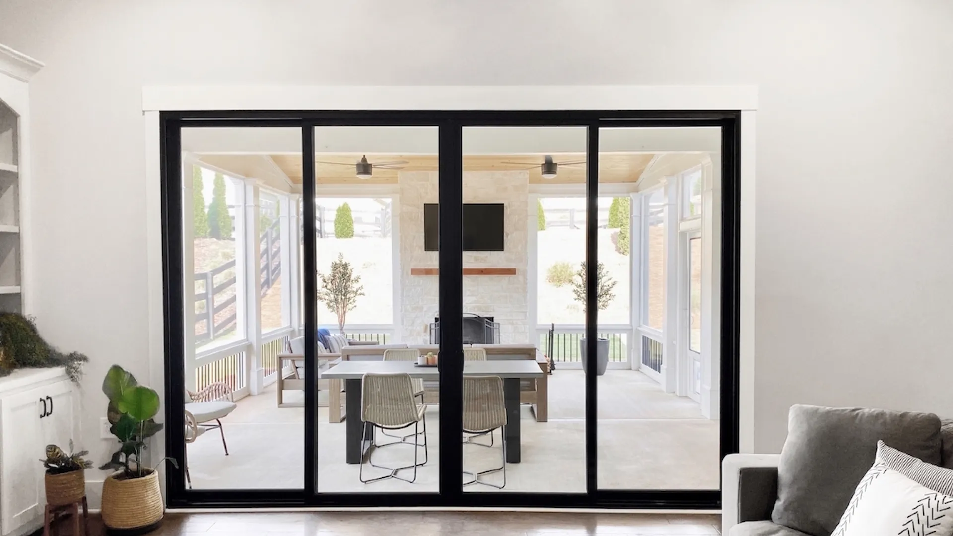 Black sliding patio doors made by Infinity from Marvin