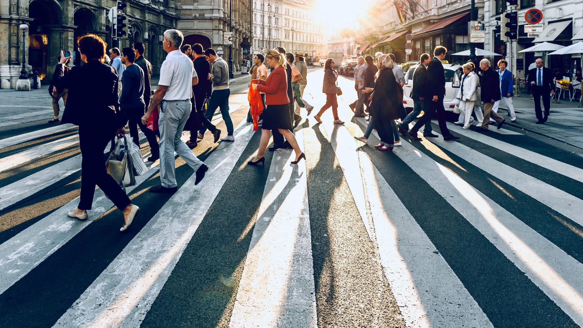 a crowd of people walking on a street