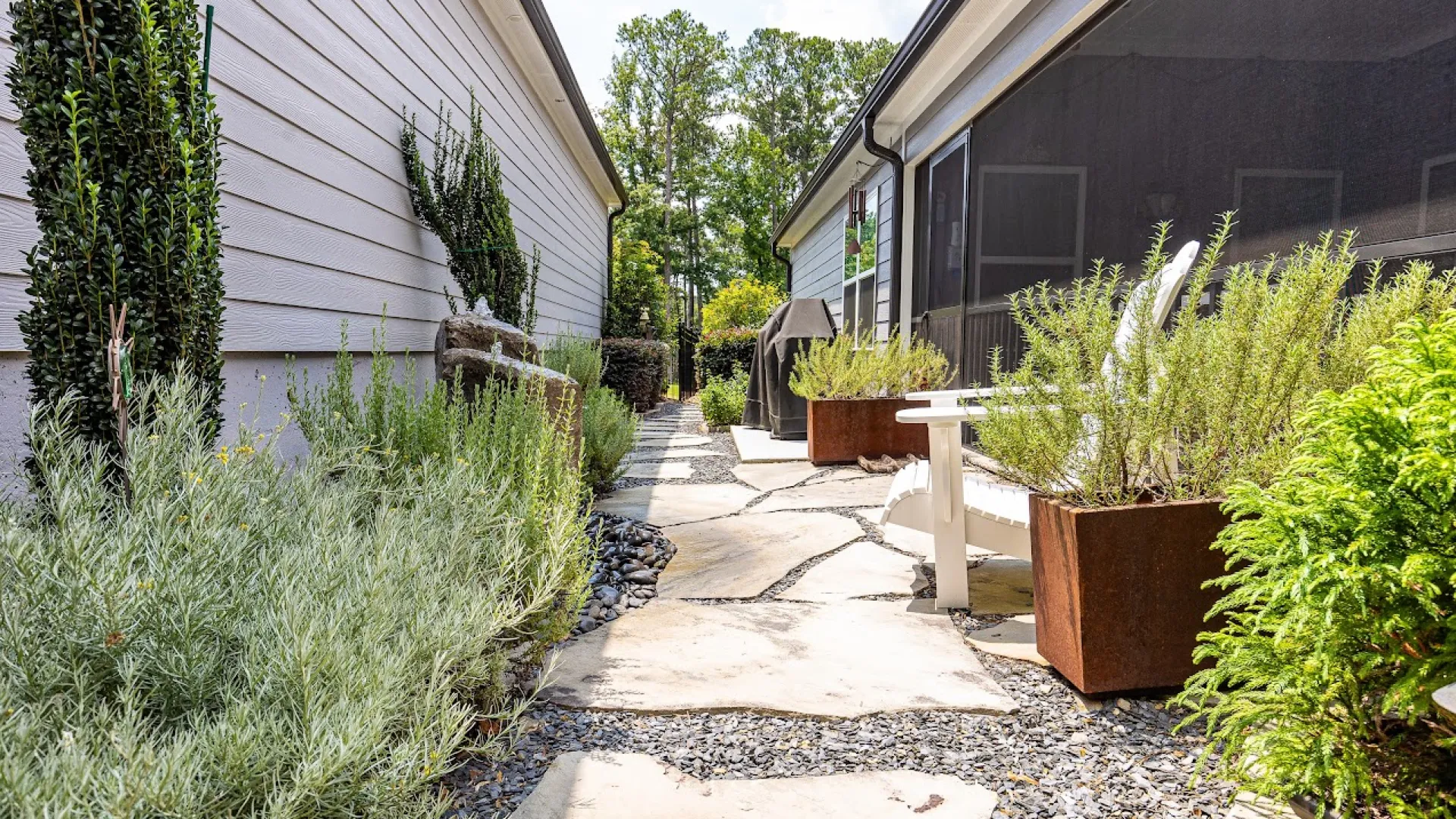 a small garden in front of a house