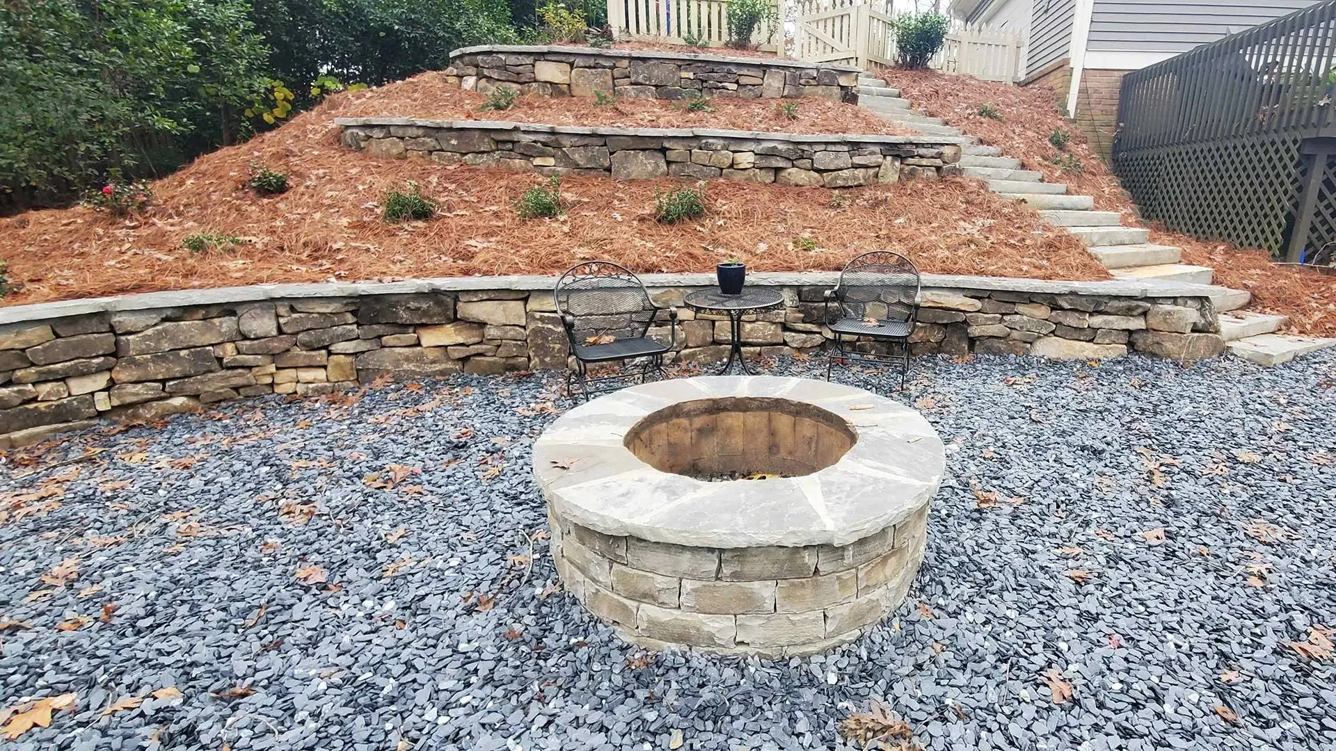 a round fountain in a courtyard