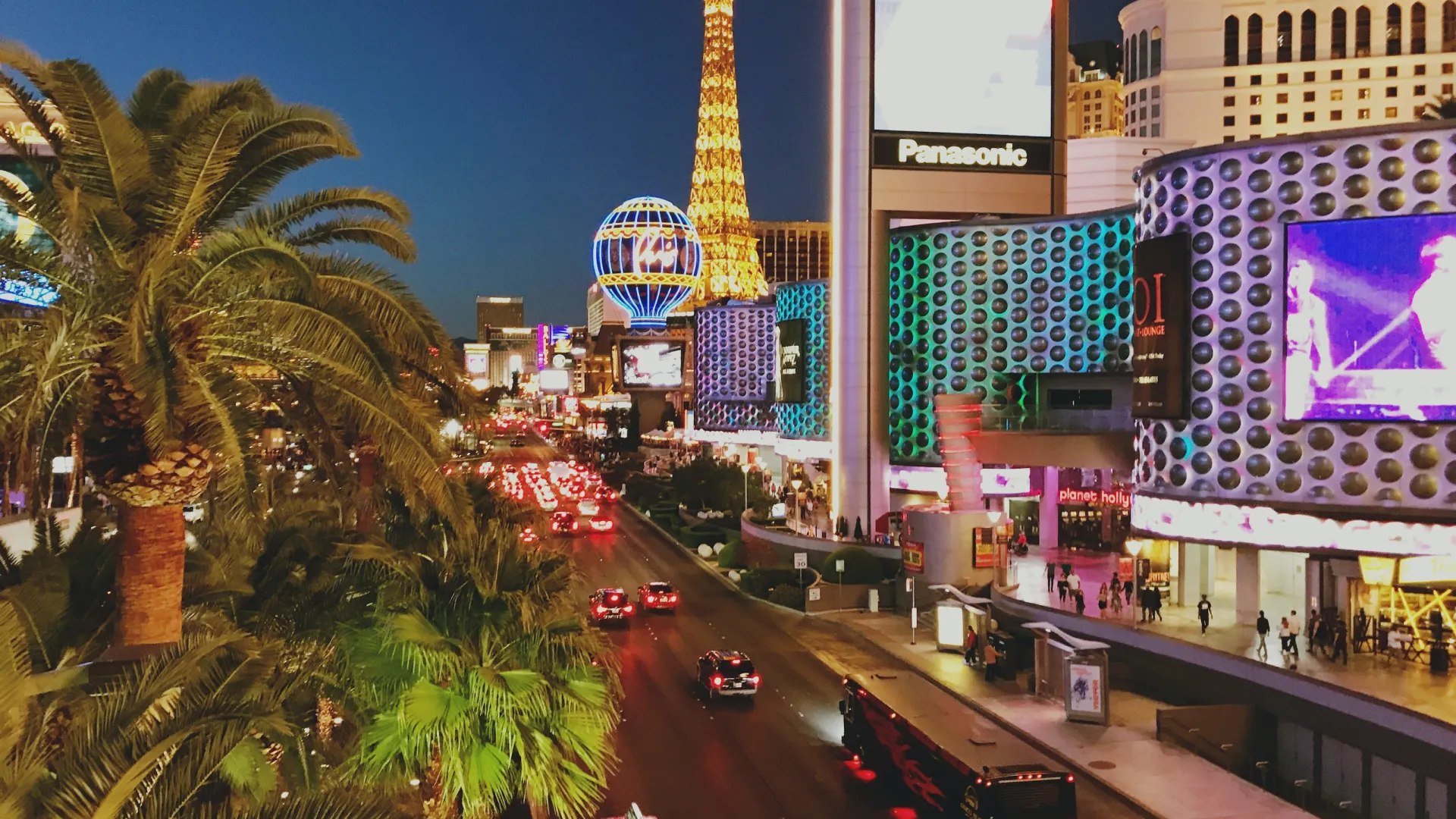 las vegas strip with cars and palm trees