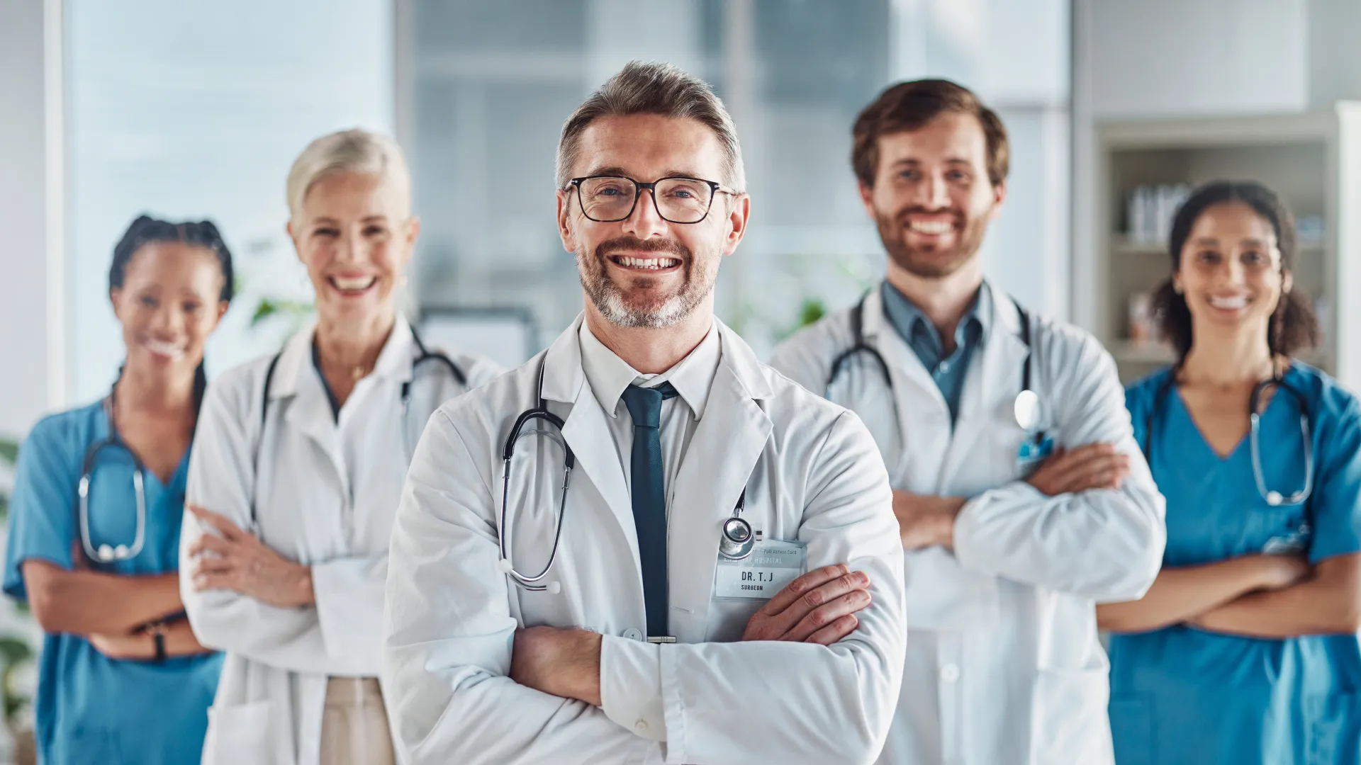 a group of doctors posing for a photo