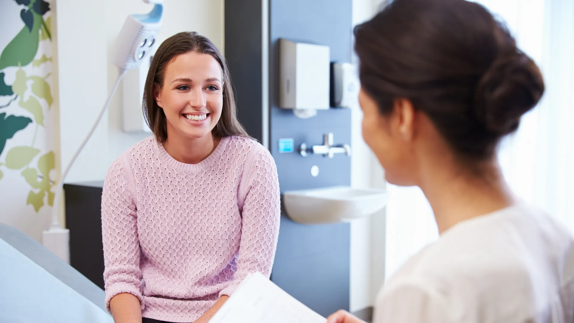 a doctor talking to a patient
