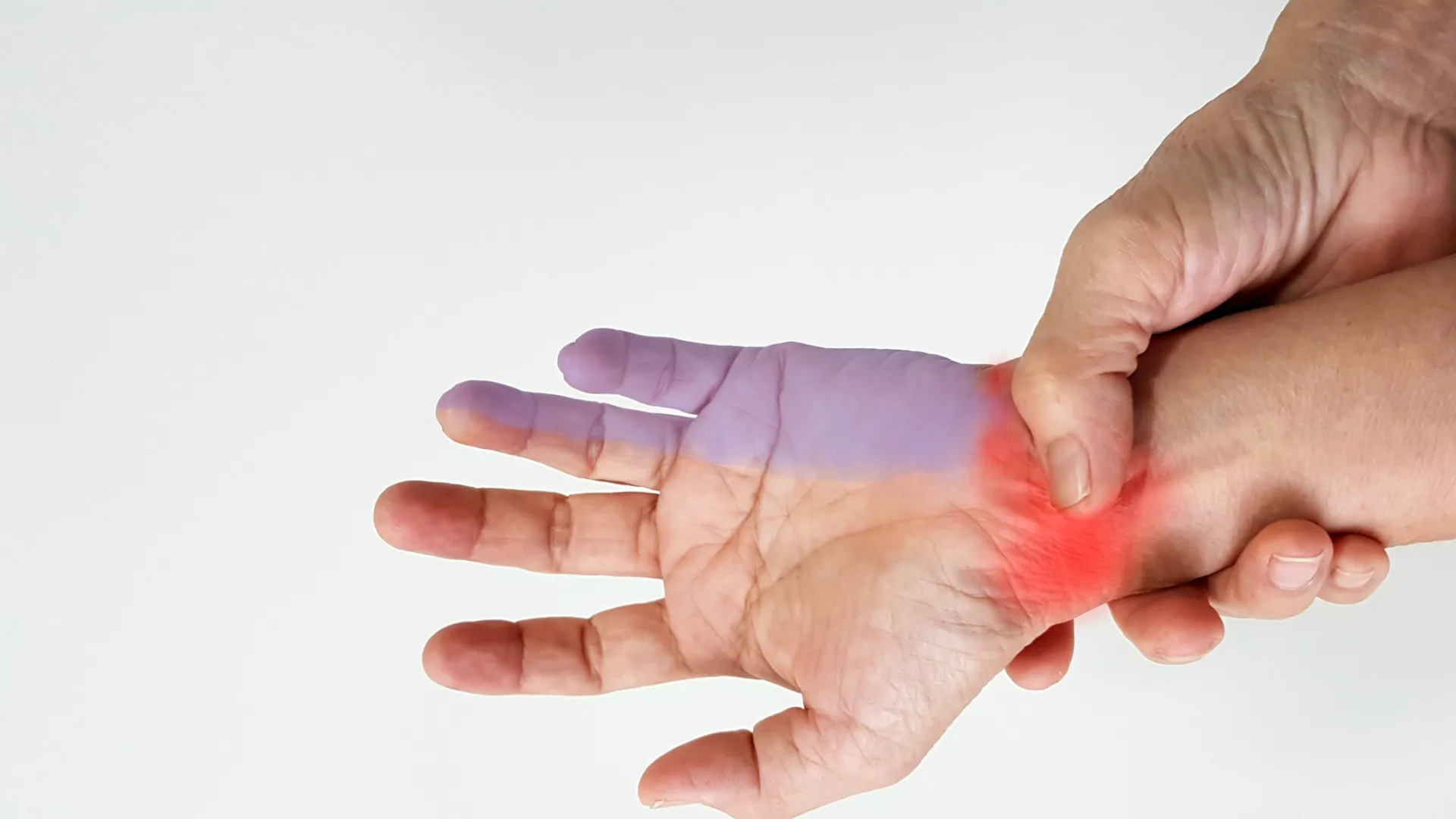a person's hand holding up their fingers