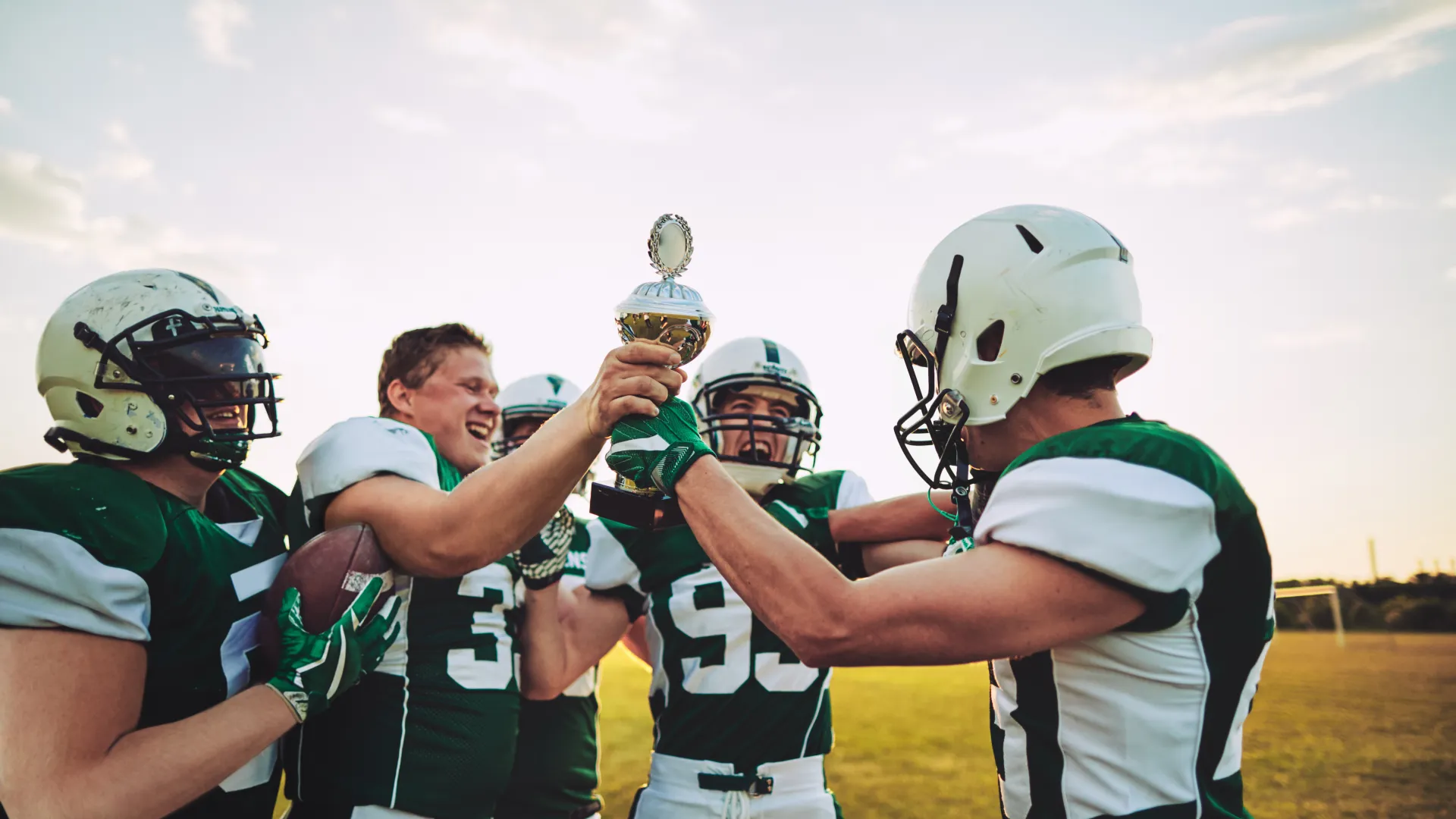 a group of people wearing football gear