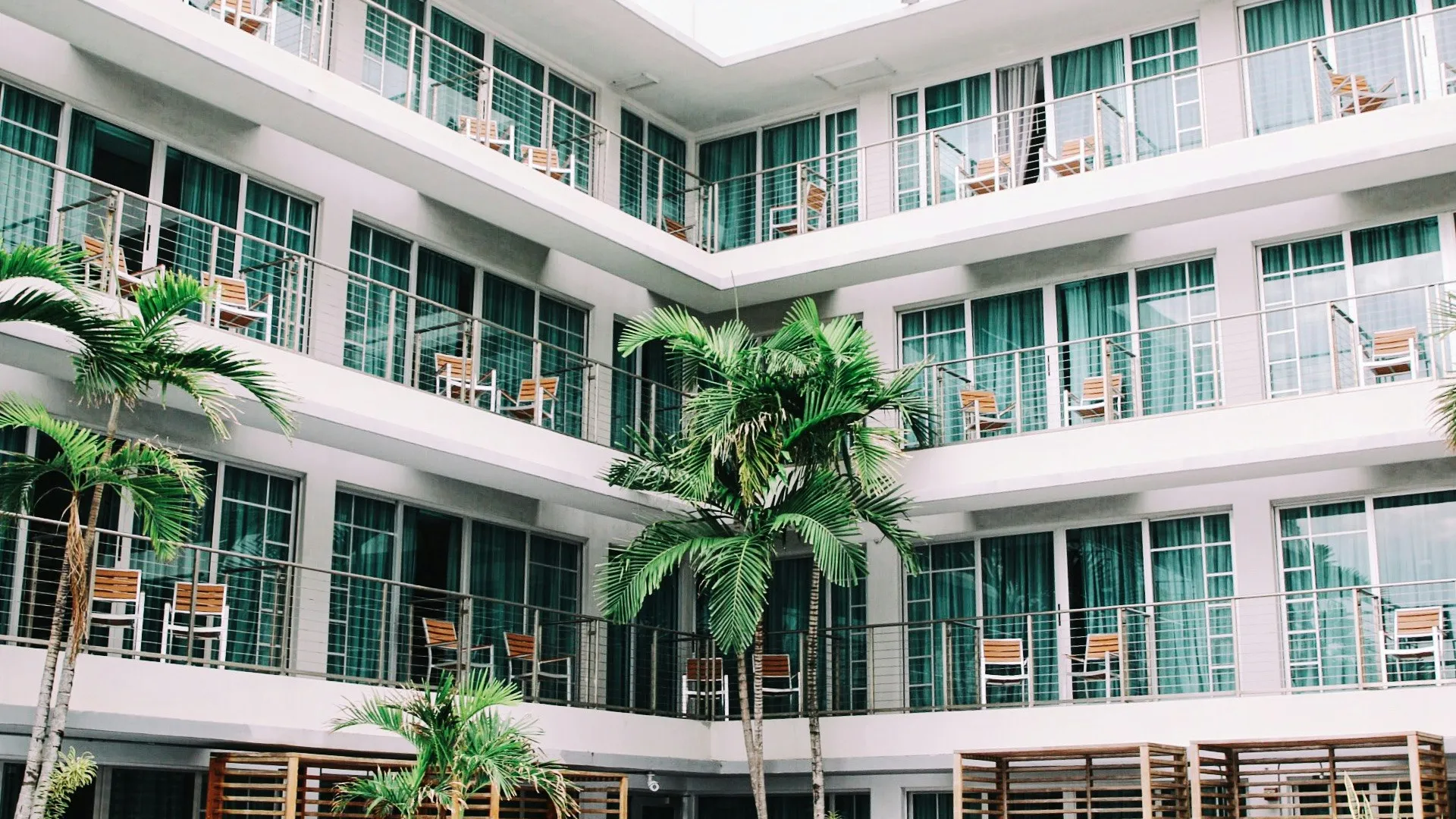 a building with palm trees
