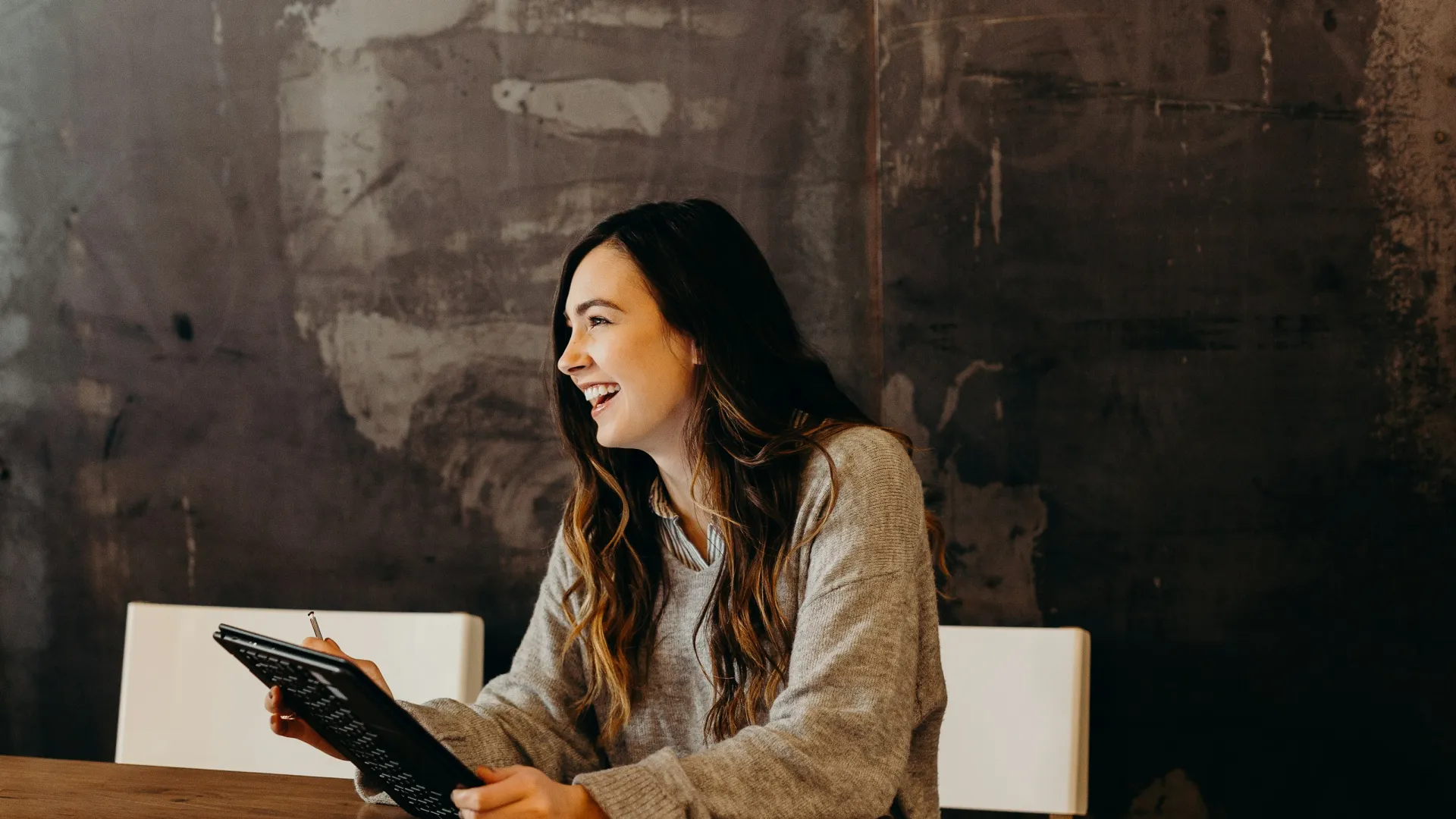 a woman sitting at a desk