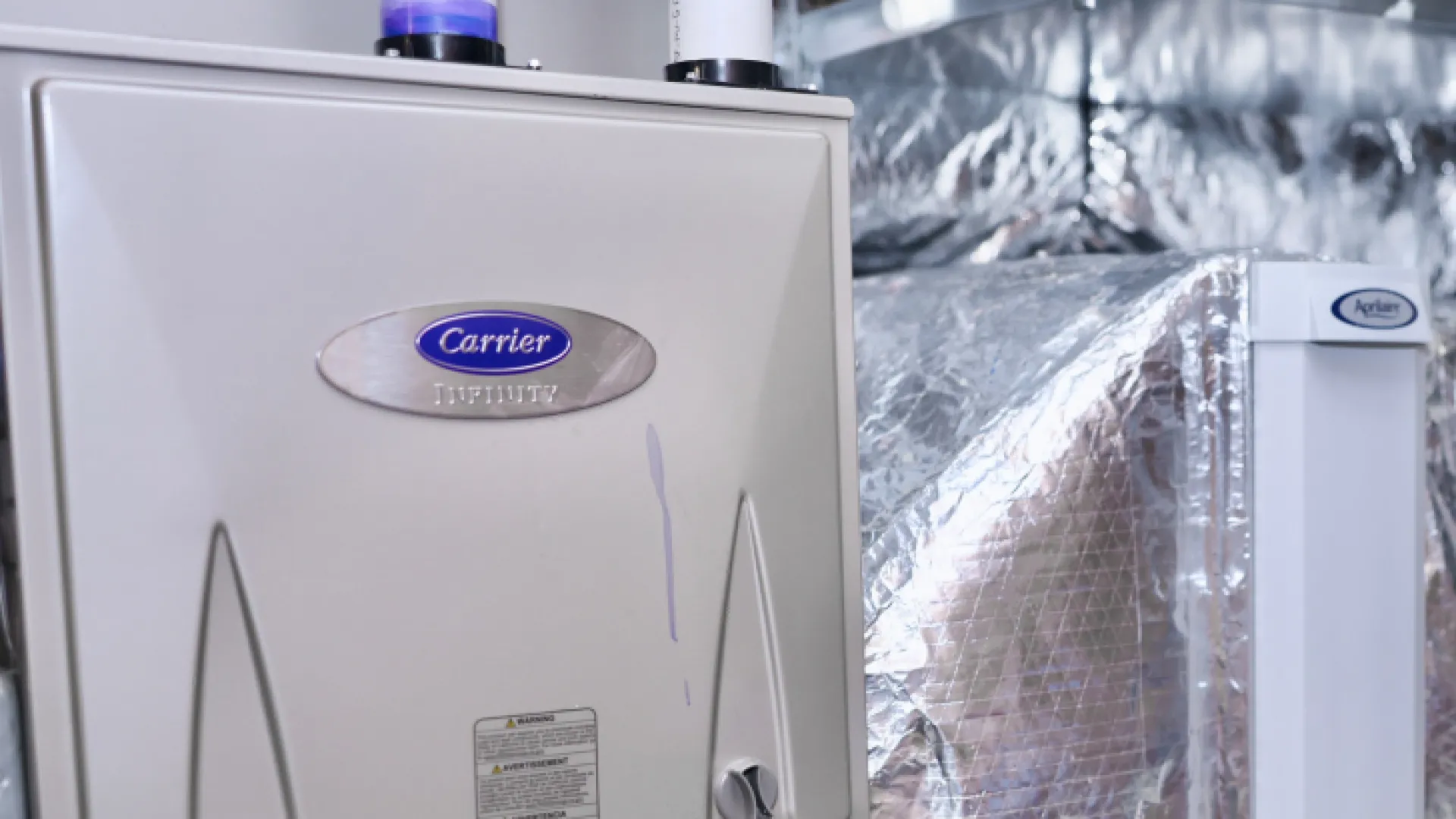 a white machine with a blue label