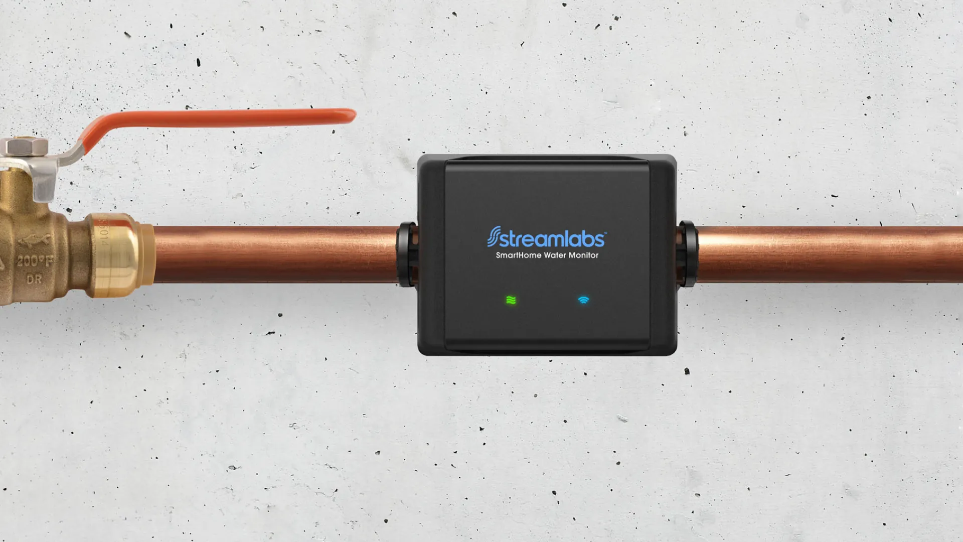 Streamlabs SmartWater Meter installed on copper pipes with valve against a concrete wall background