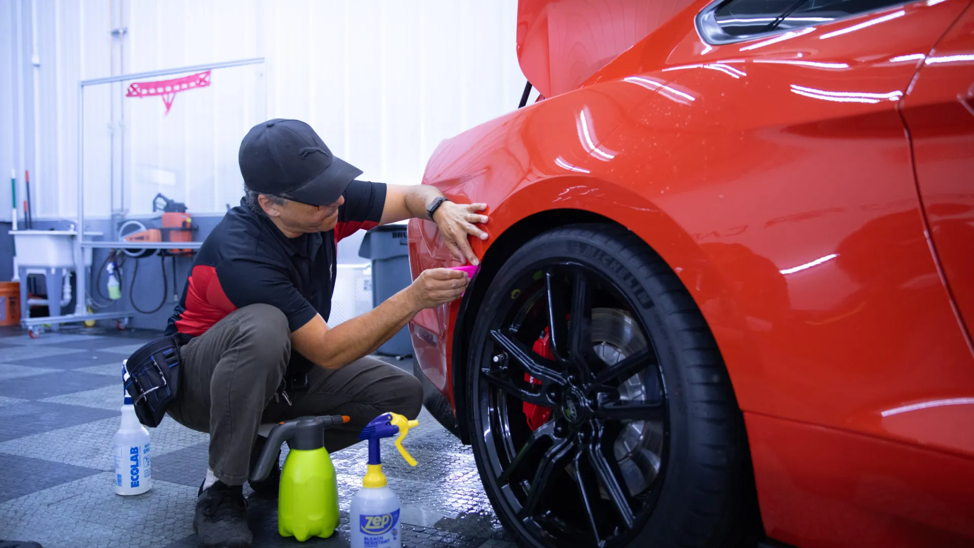 a person fixing a car