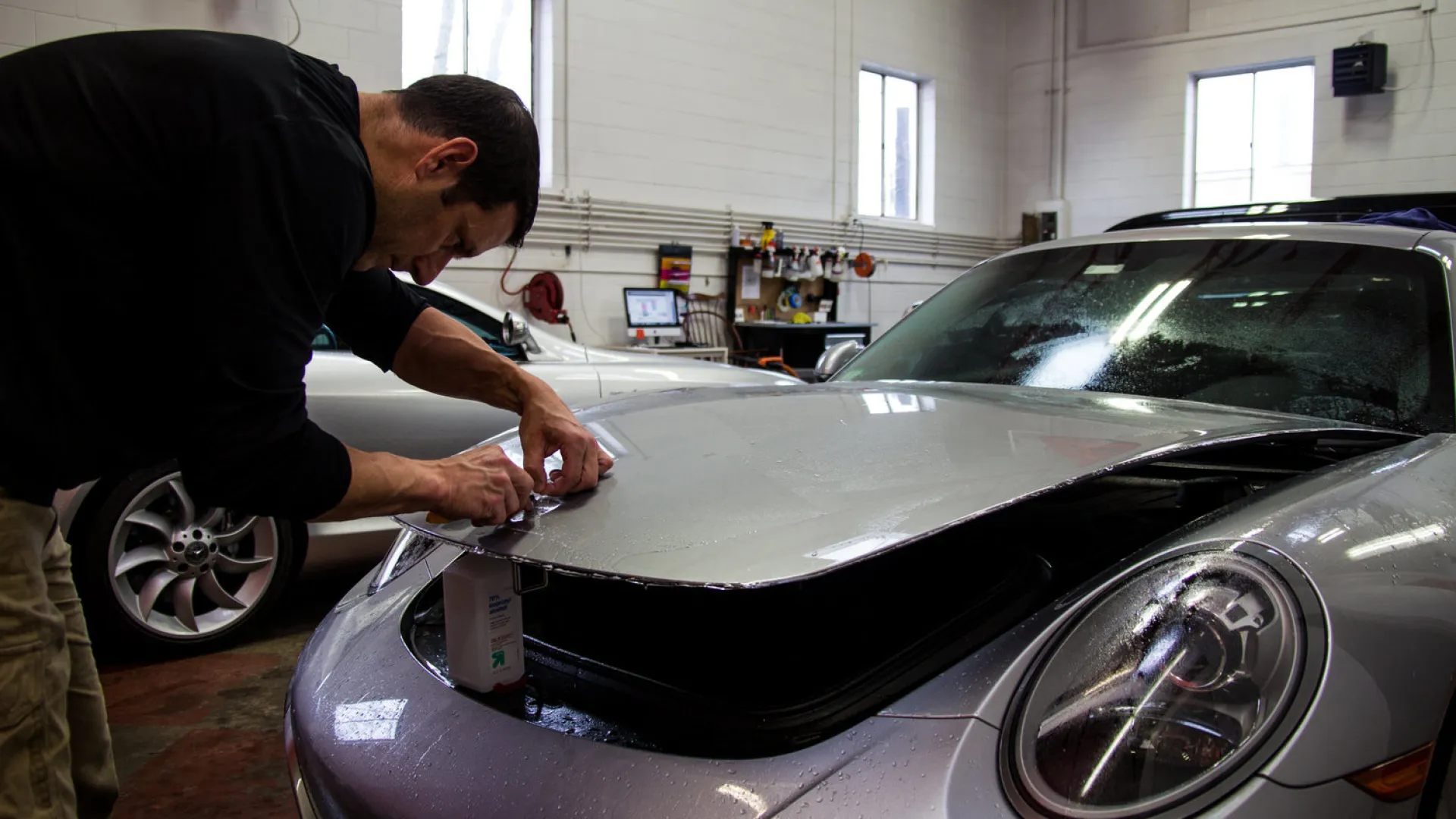 a man working on a car