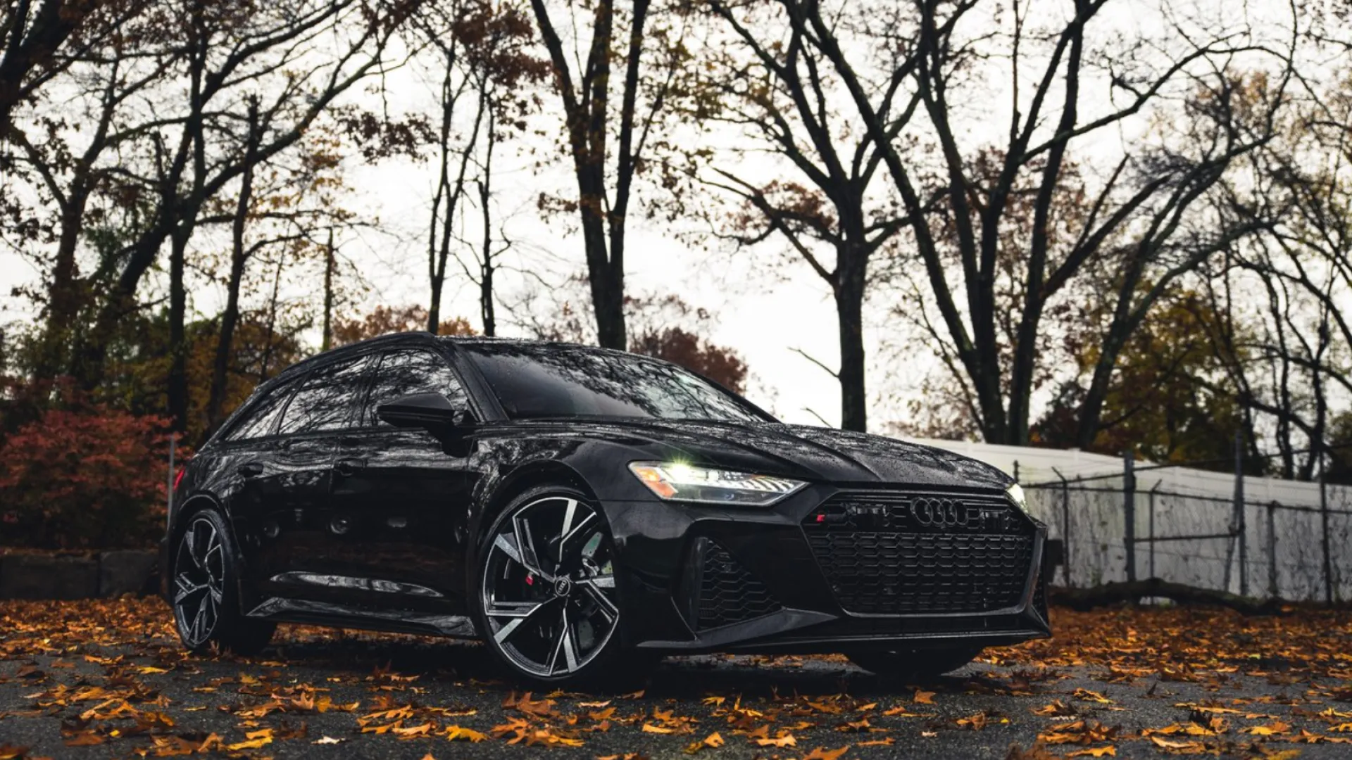 a black car parked on a road