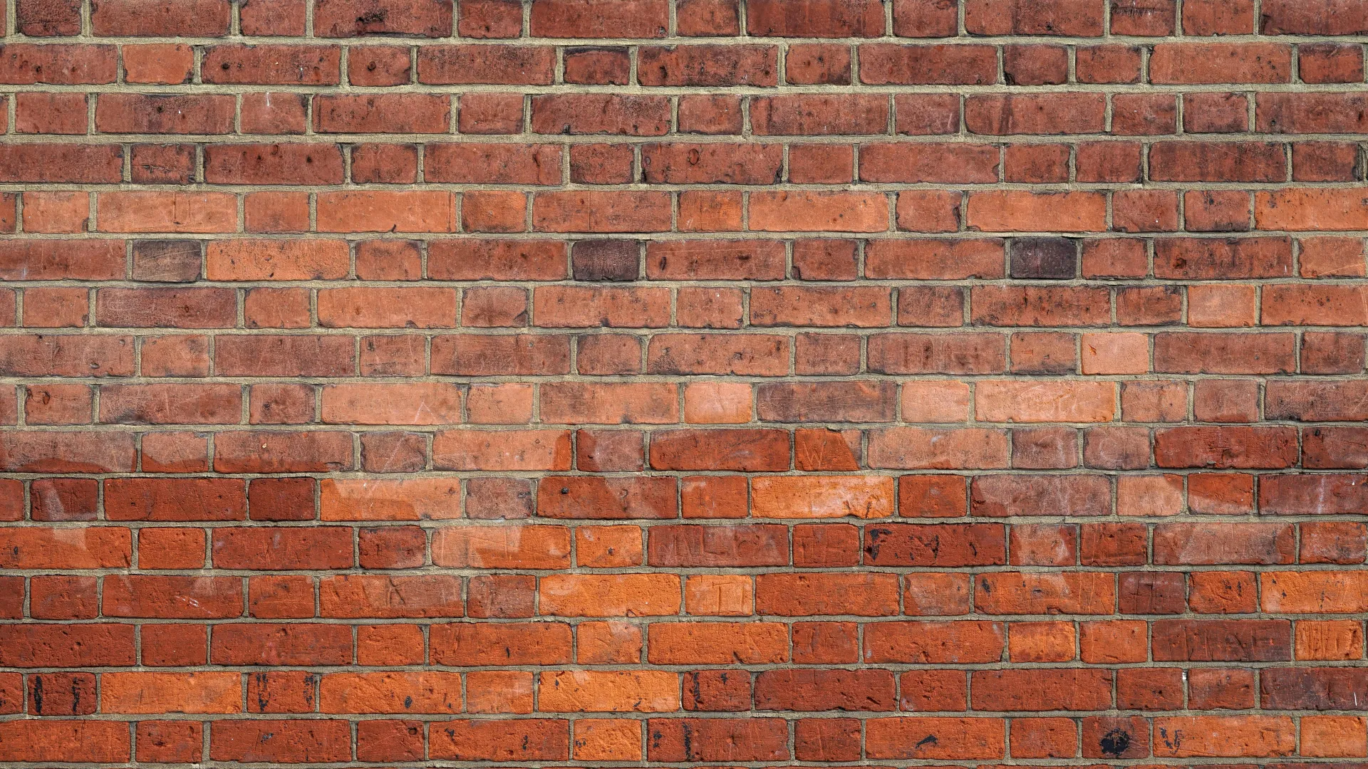 a brick wall with holes