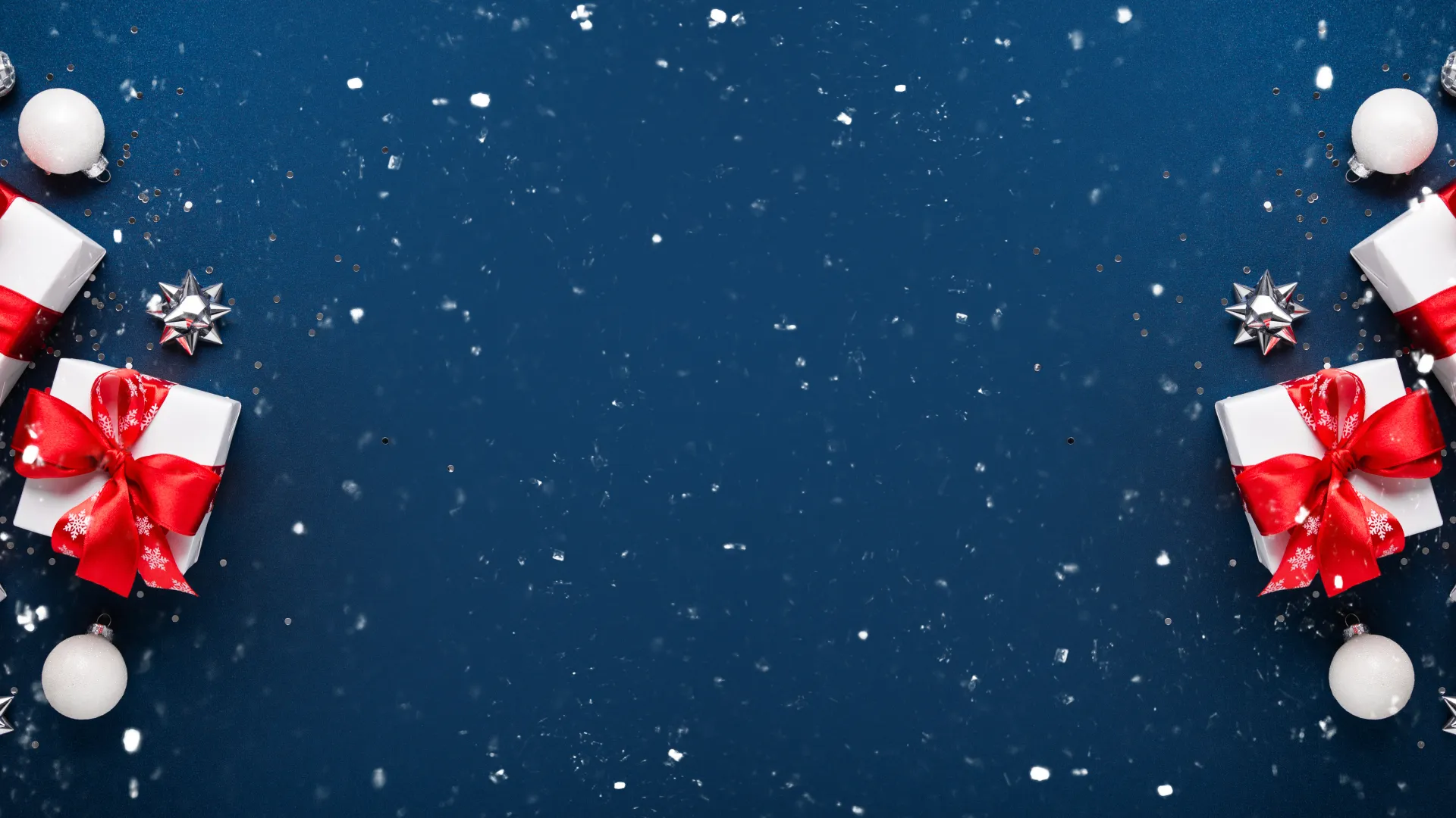 a group of red and white christmas ornaments on a blue background