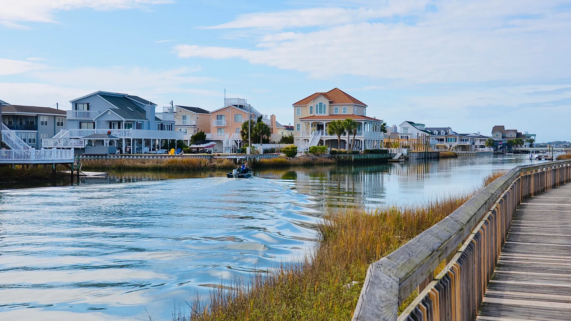 a body of water with buildings along it