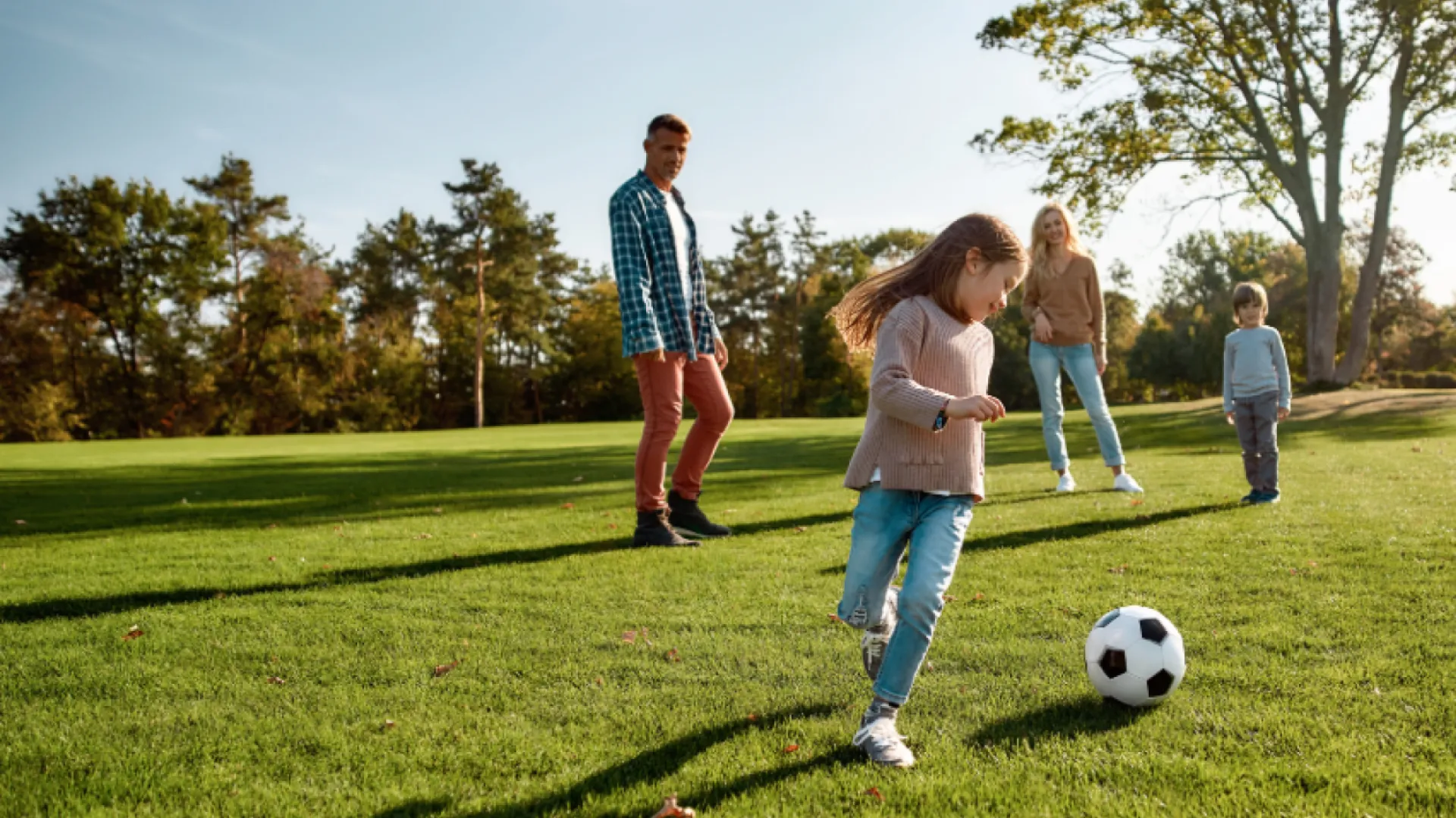 a group of people playing soccer