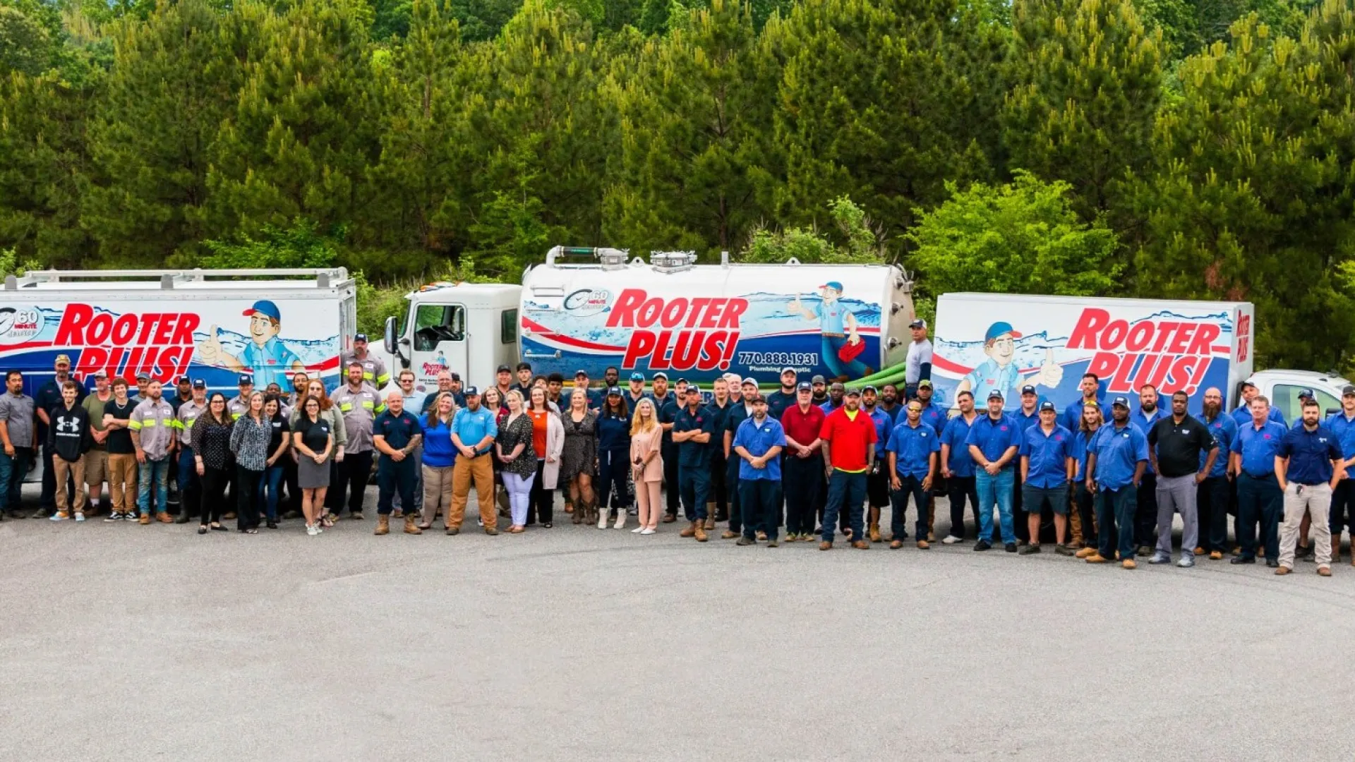 a group of people standing in front of a line of food trucks