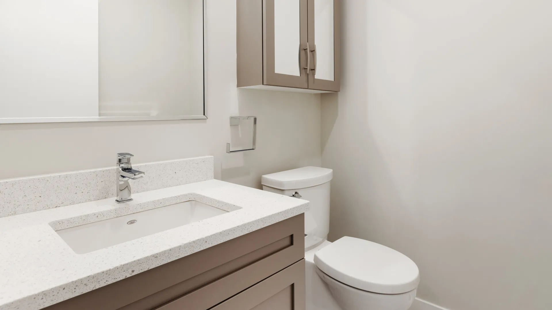 a bathroom with a sink and toilet