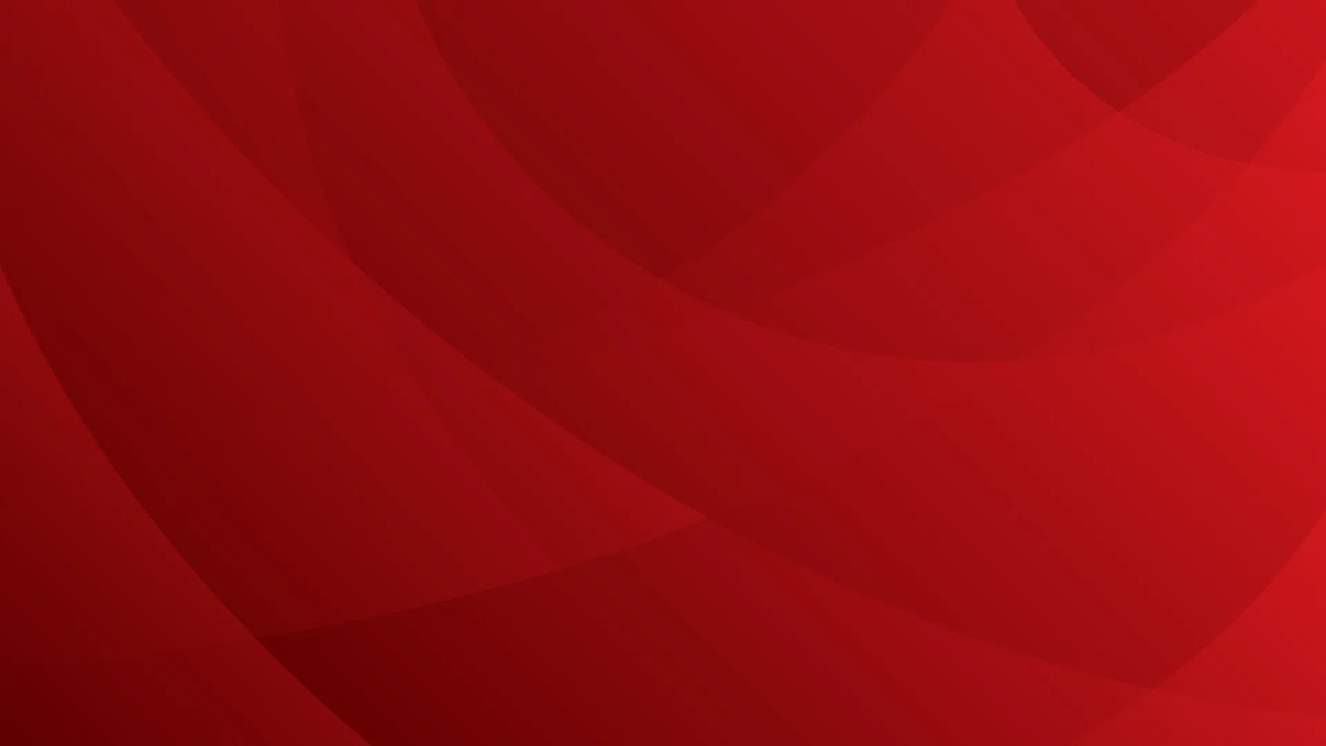 Abstract red background with smooth layered curved shapes creating depth and gradient effect.
