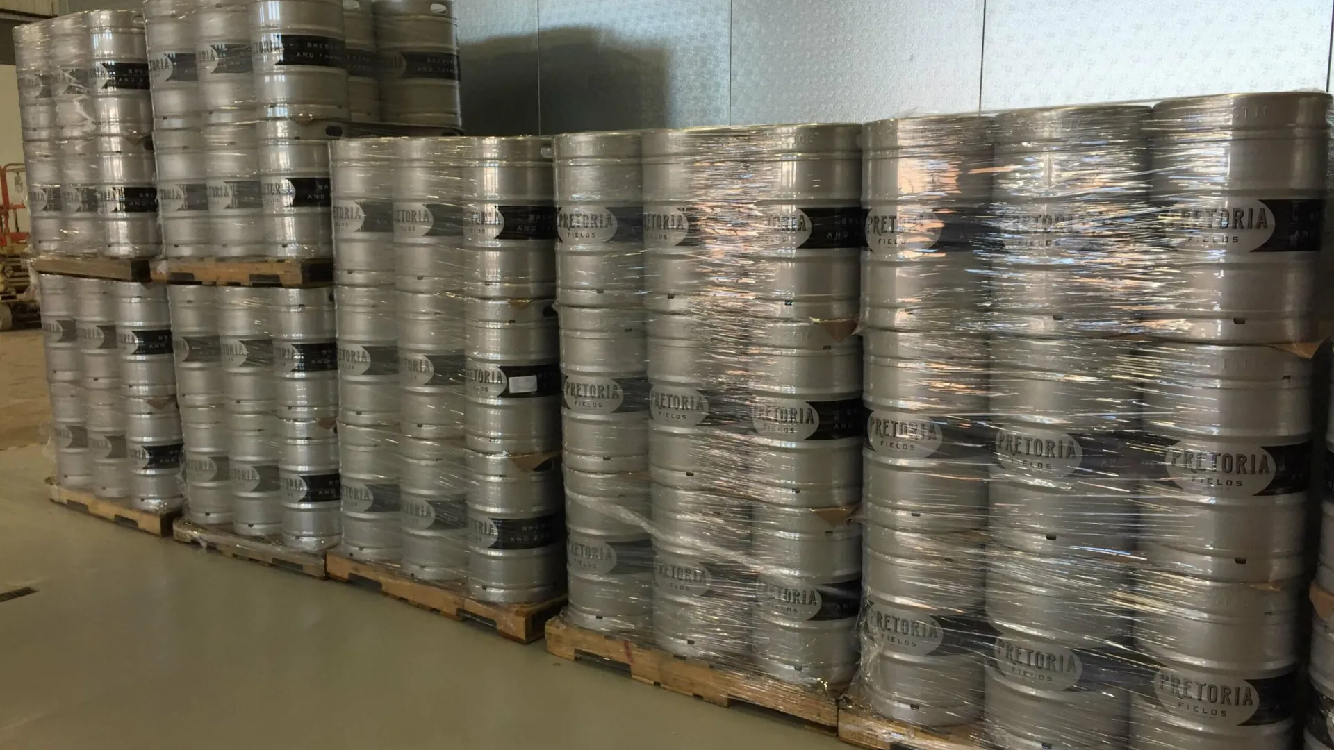 a large stack of metal containers