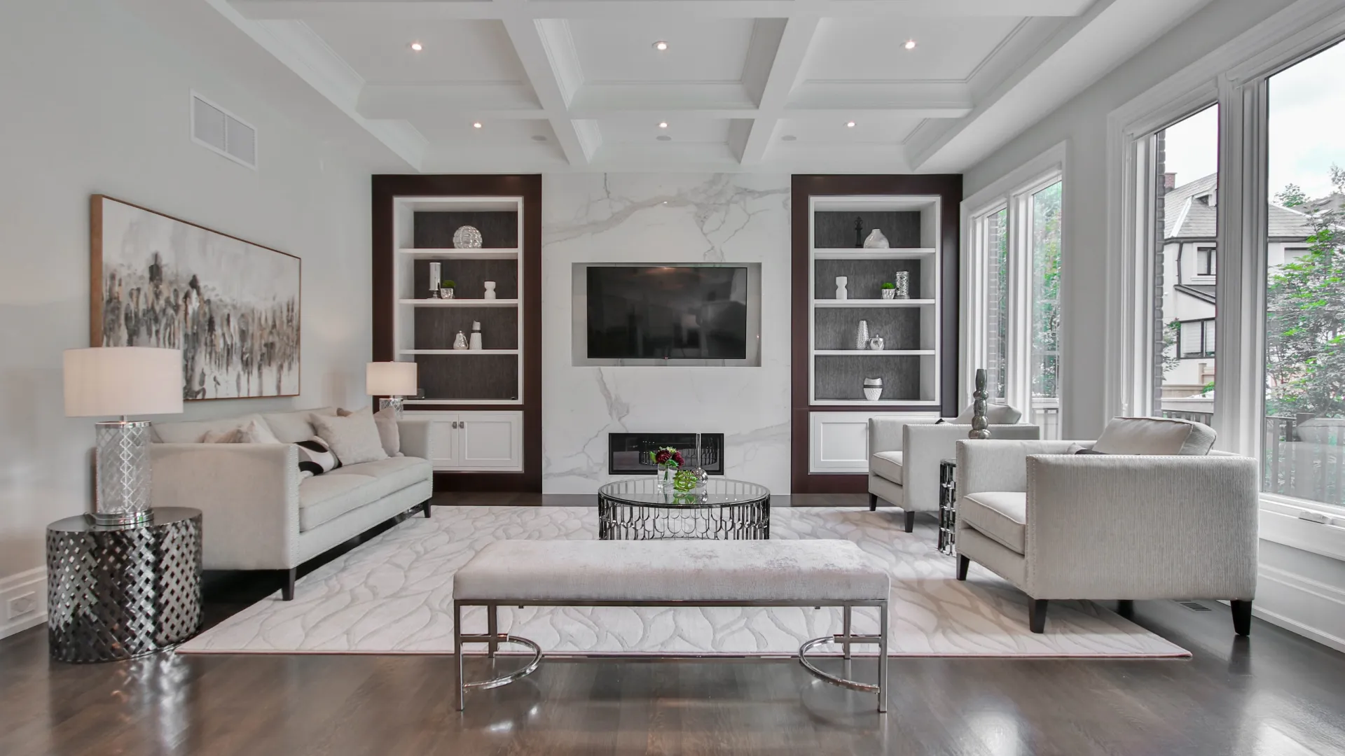 a living room with a large tv and a couch