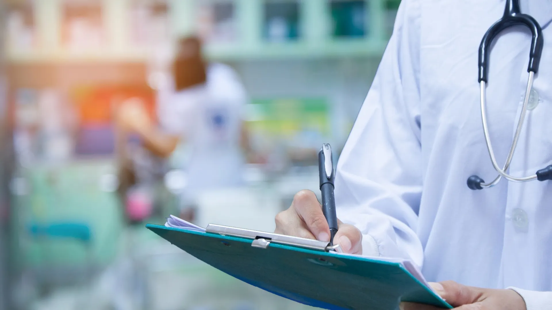a doctor using a tablet