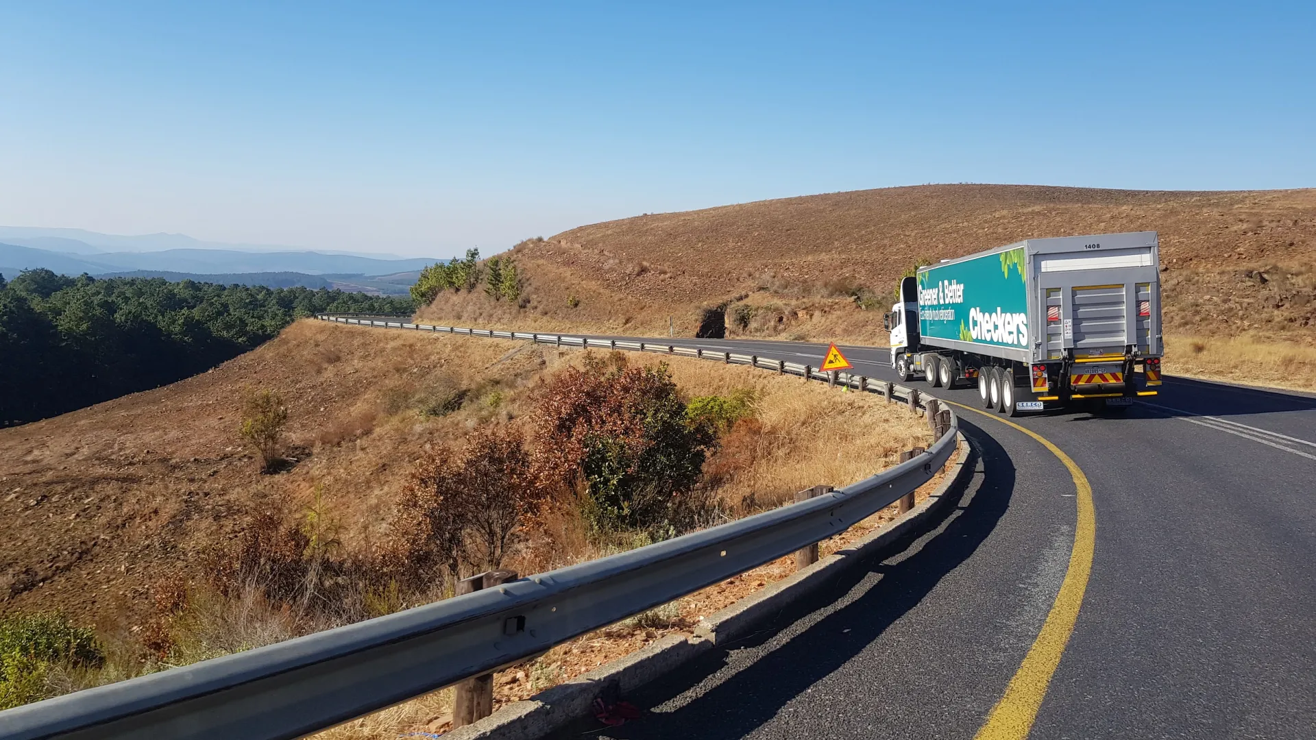 a truck driving down the road