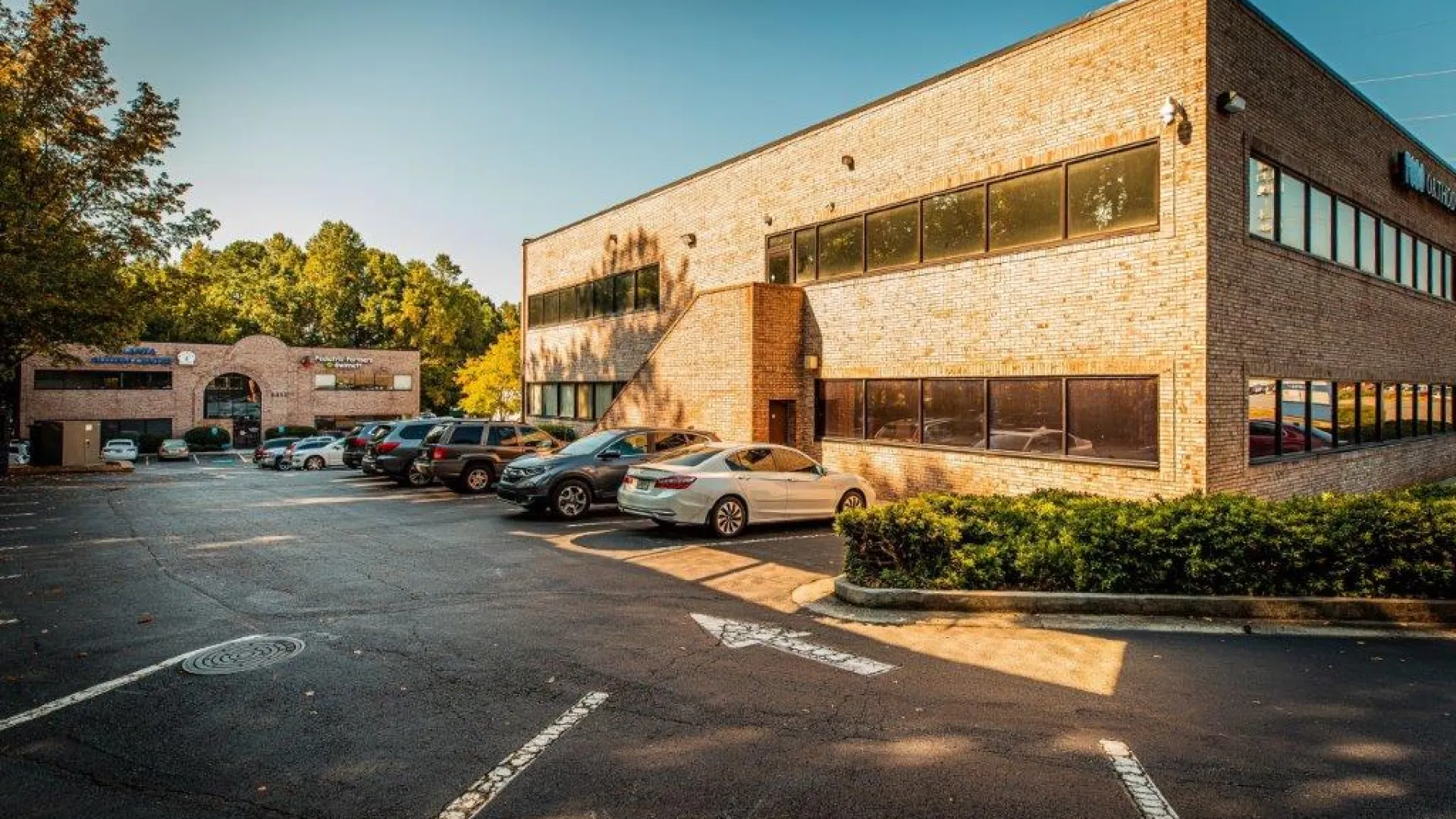 a parking lot with cars