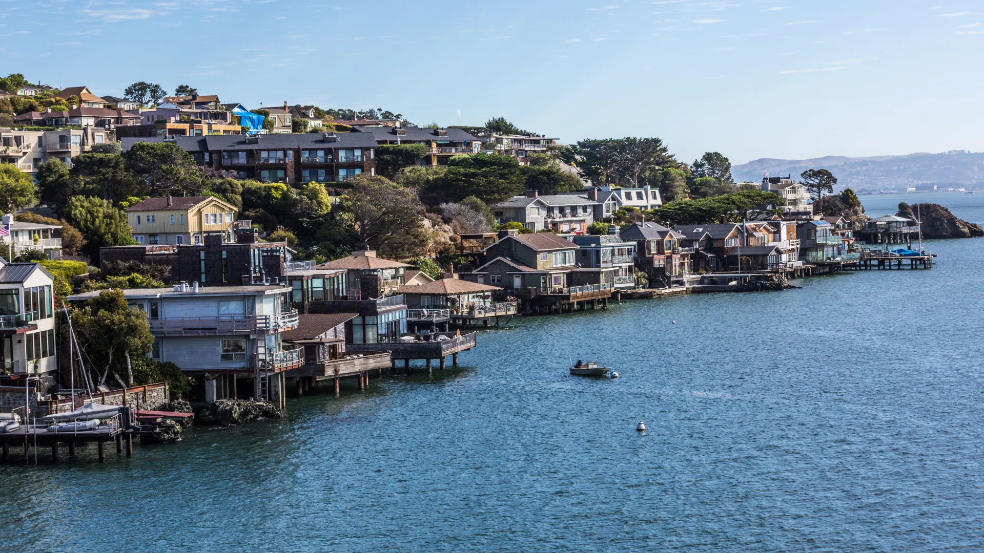 a body of water with buildings along it