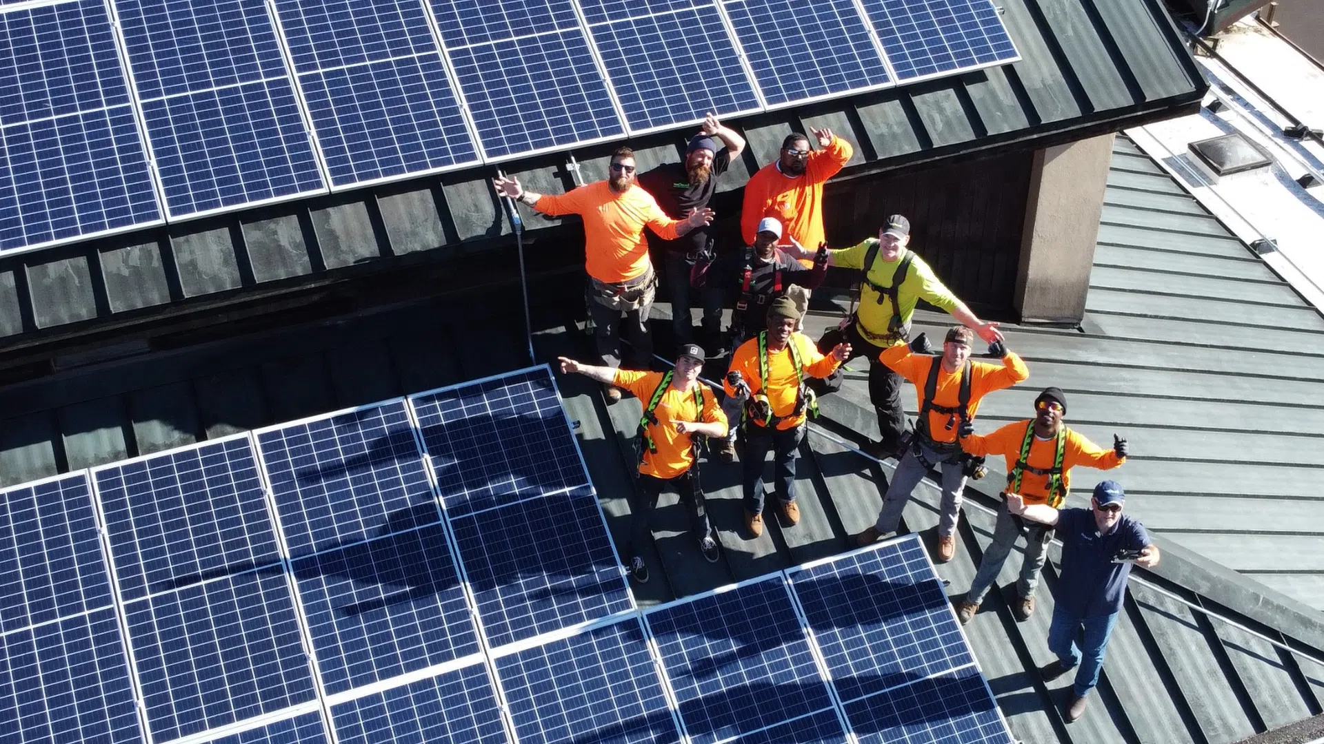 solar, battery & heat pump installers on a petaluma roof with solar panels