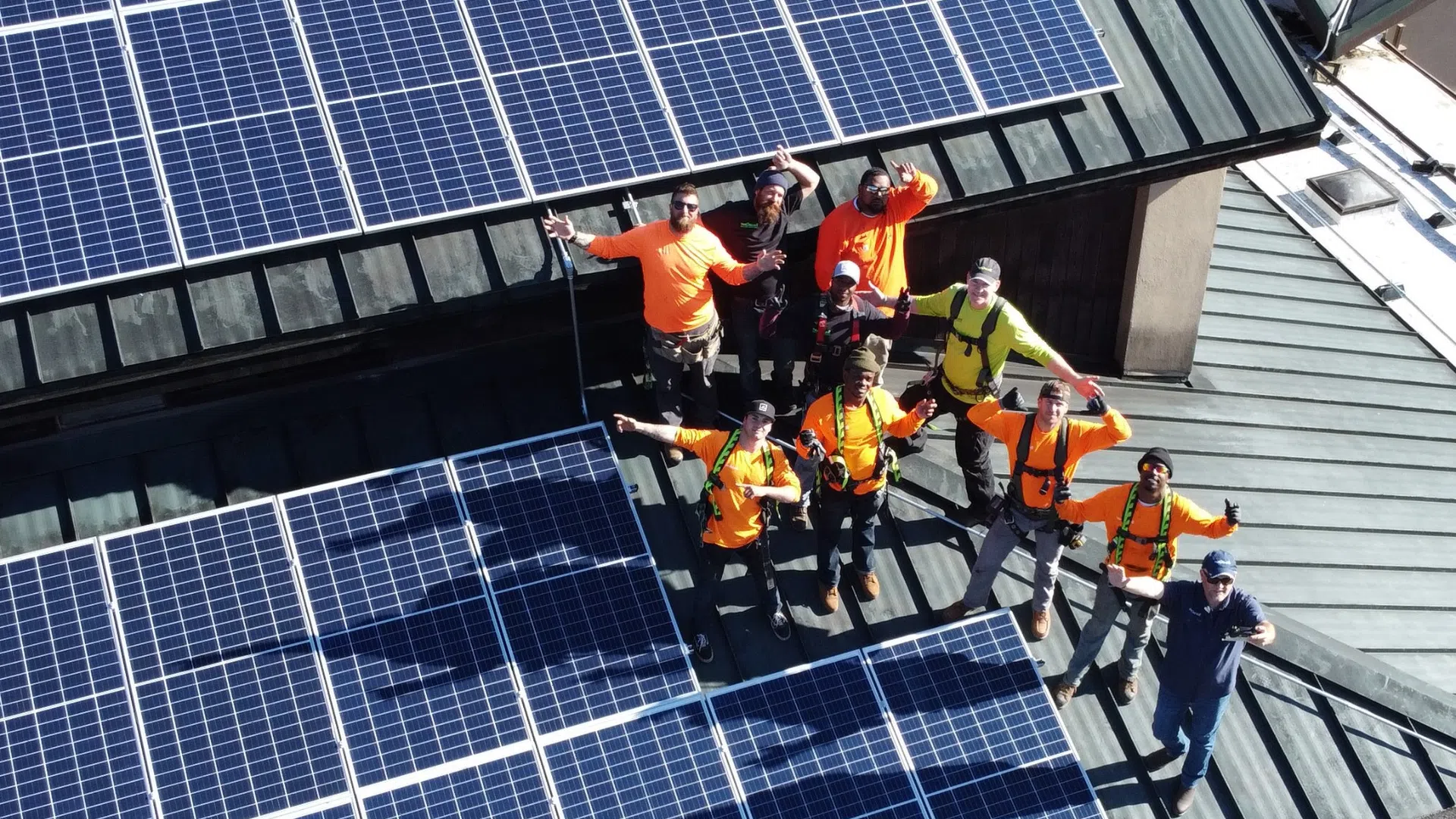 solar, battery & heat pump installers on a mill valley roof with solar panels